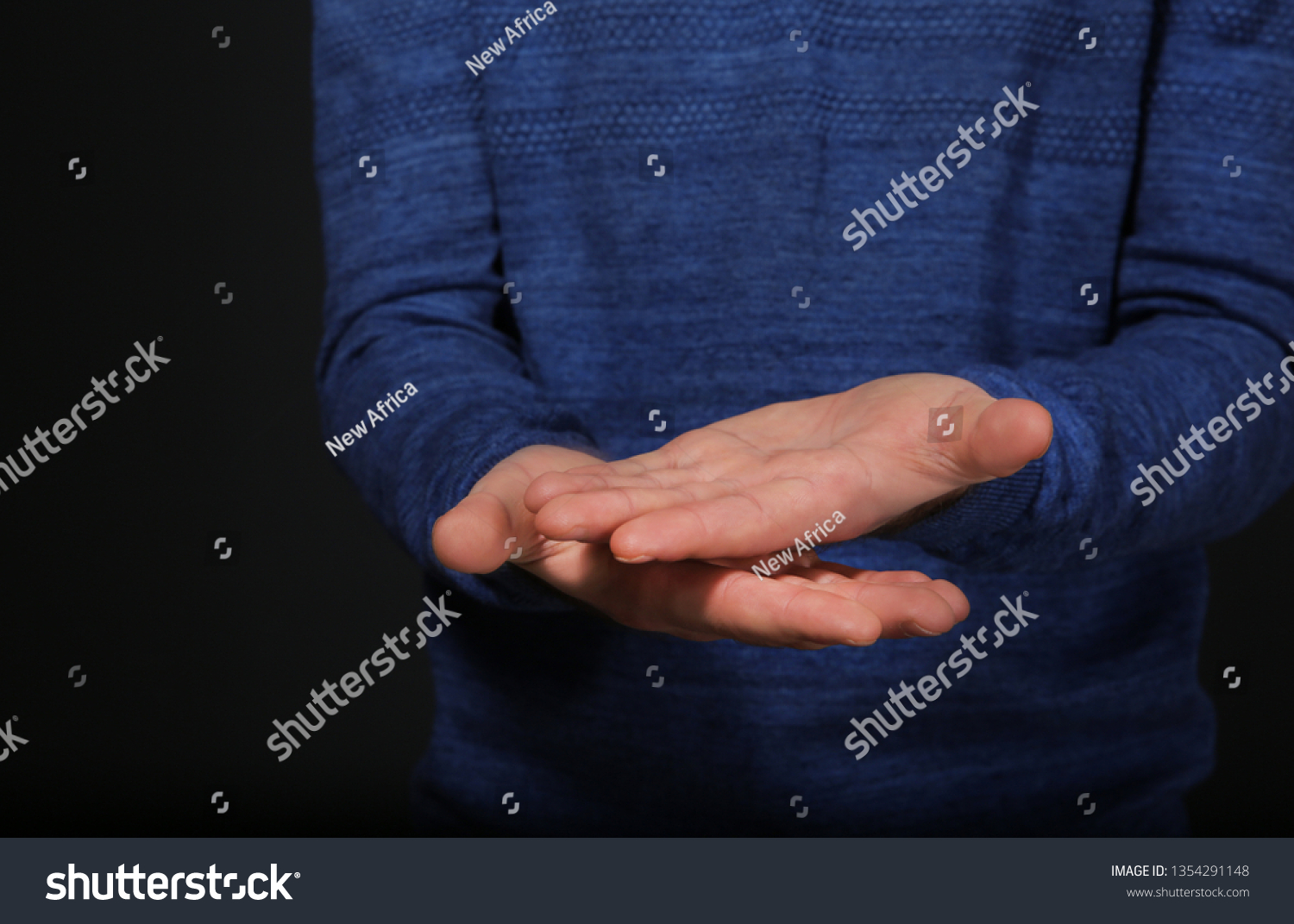 man-showing-word-good-sign-language-stock-photo-1354291148-shutterstock