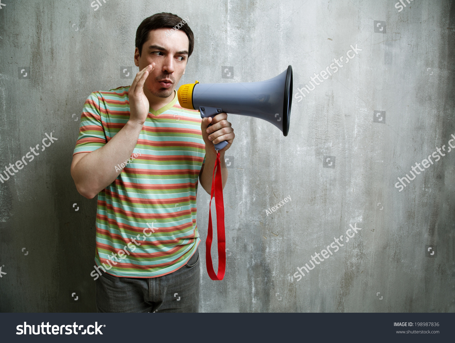 Man Sitting On Chair Holding Megaphone Stock Photo 198987836 | Shutterstock