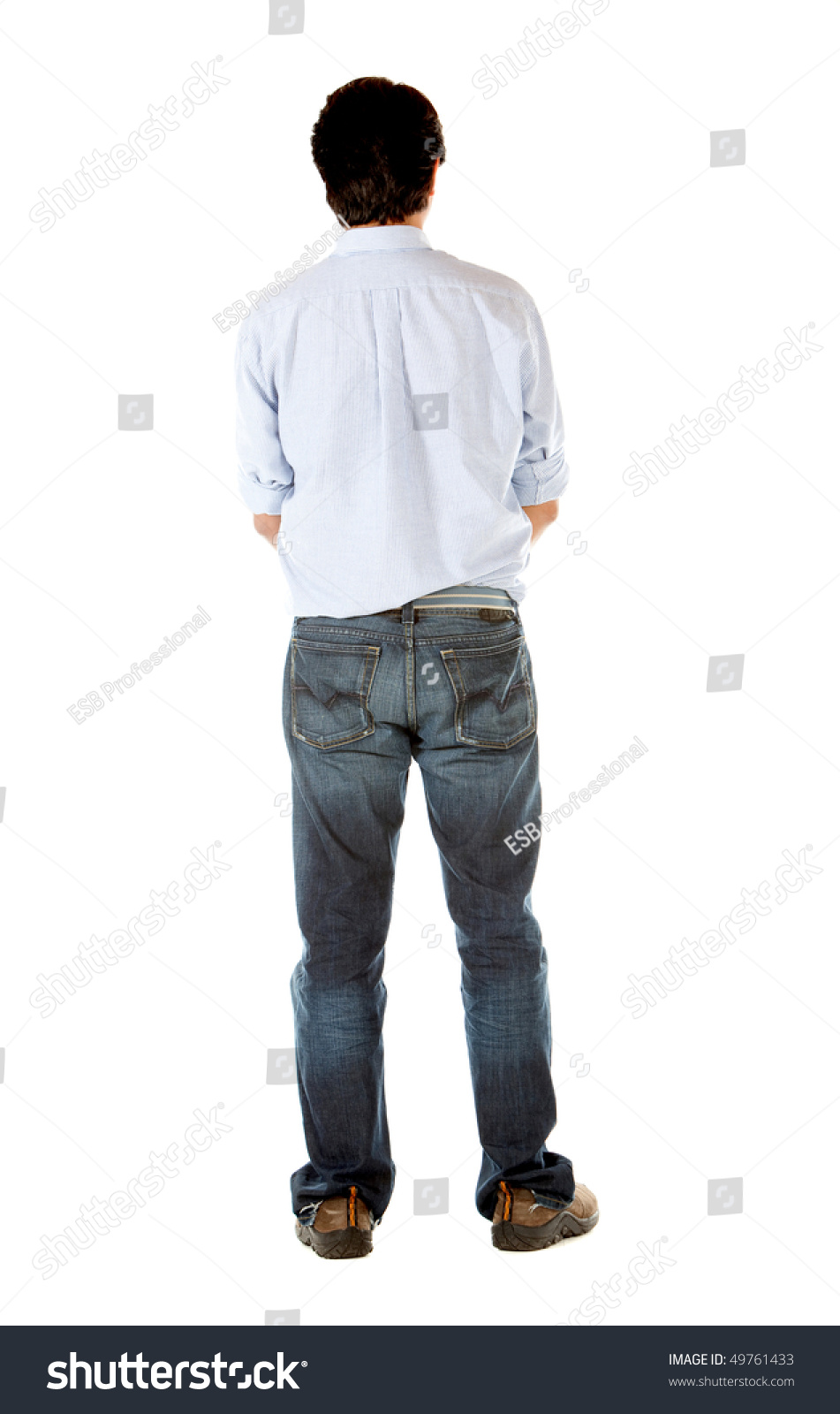 Man Standing Giving His Back To The Camera Isolated Over A White ...