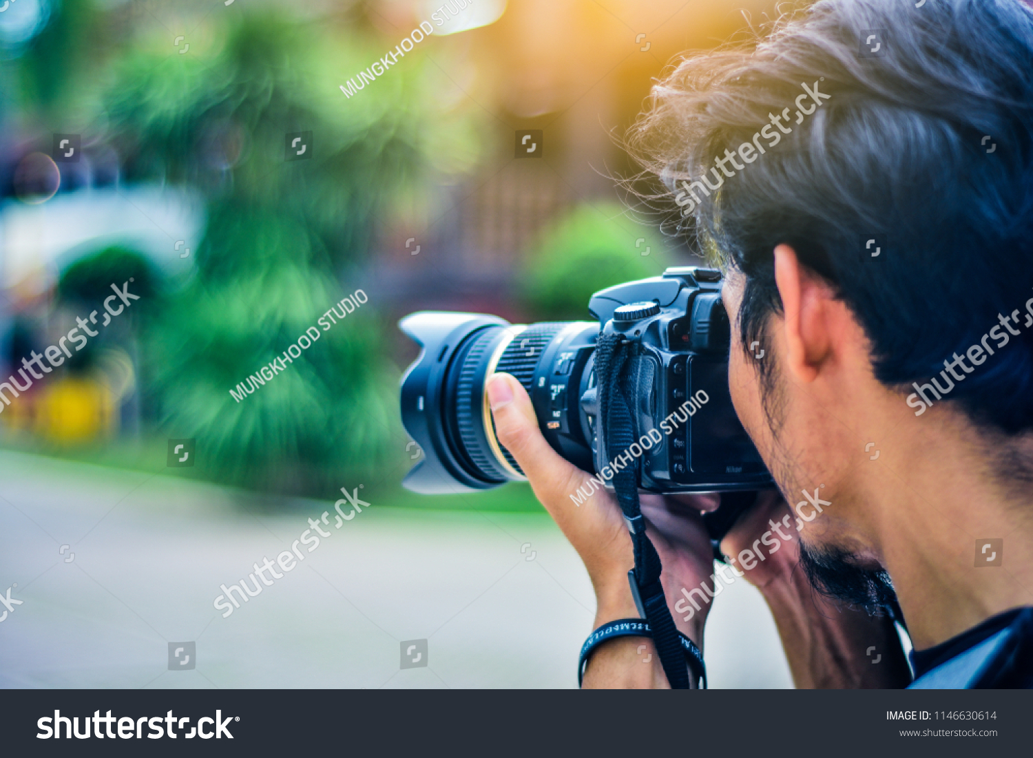 Man Using Camera Dslr Taking Photo Stock Photo Edit Now 1146630614