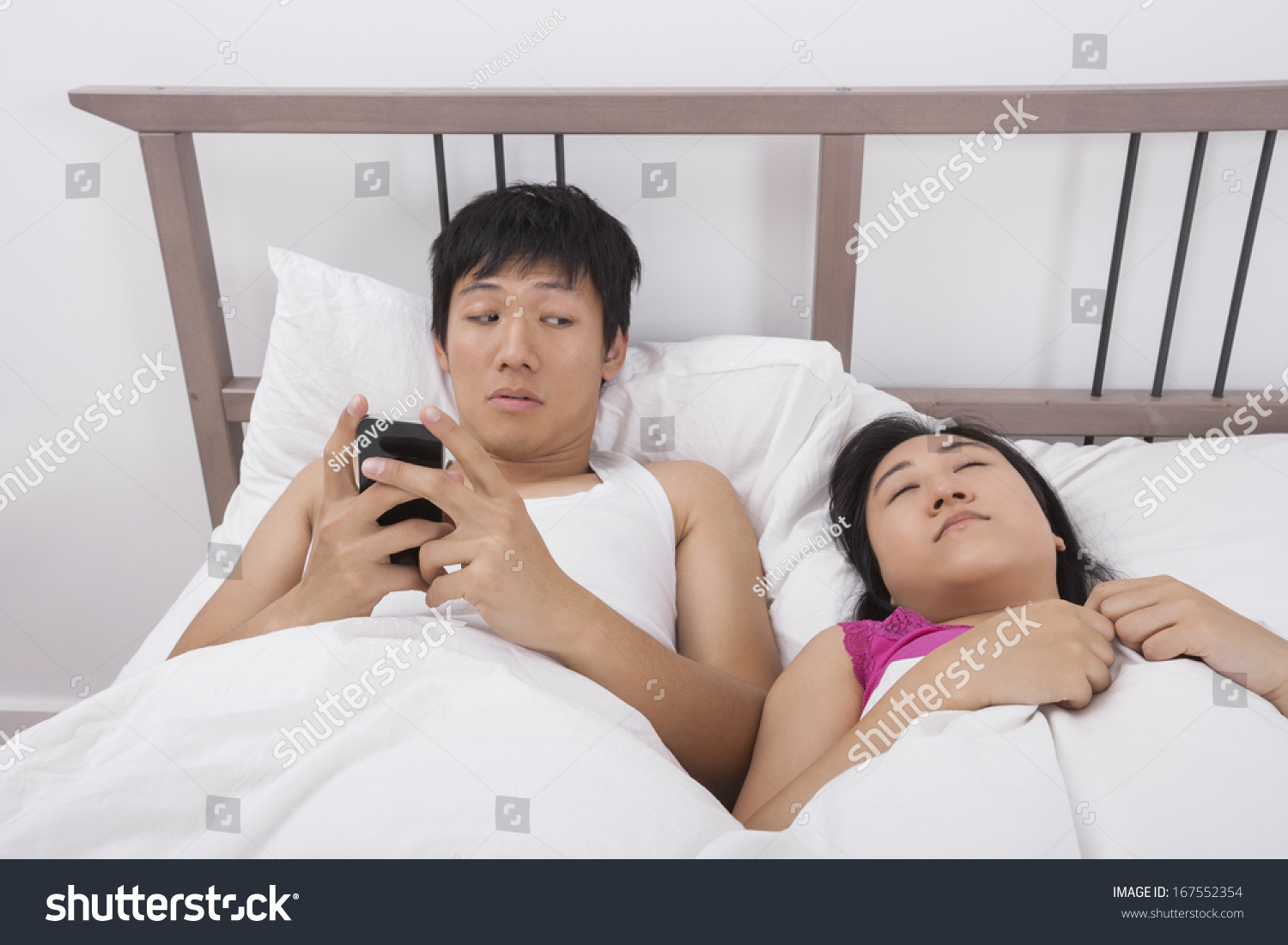 Man Using Cell Phone While Looking Stock Photo 167552354 ...