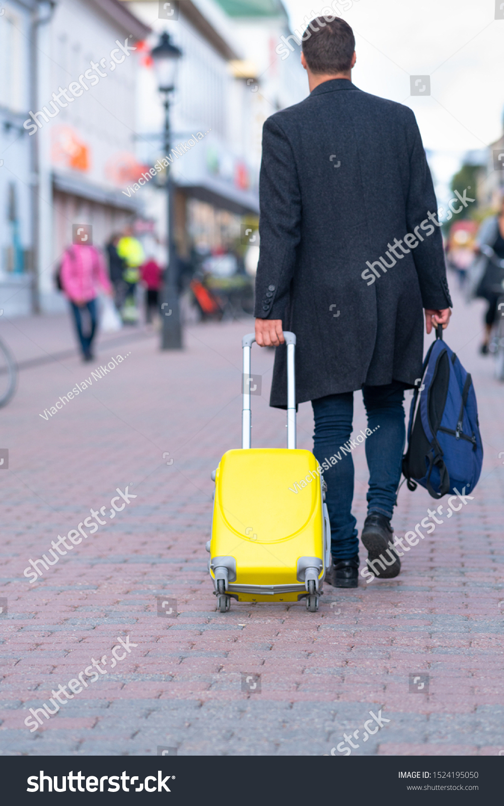 away yellow suitcase