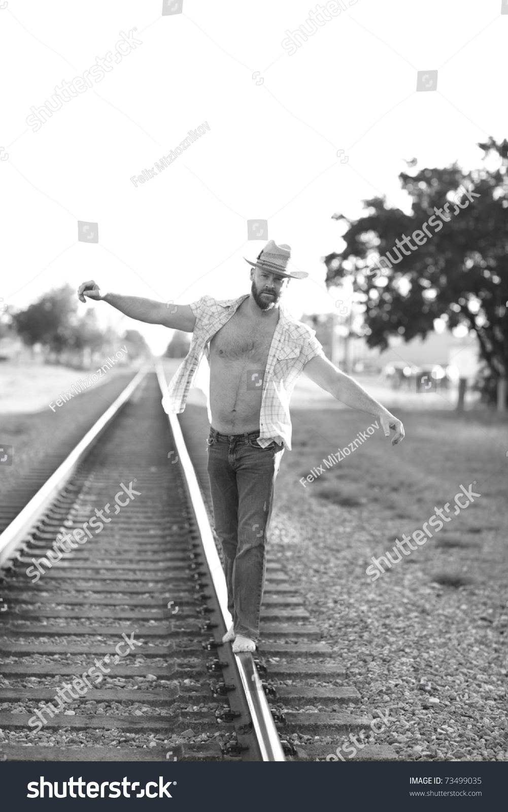 Man Walking On The Train Tracks Stock Photo 73499035 : Shutterstock