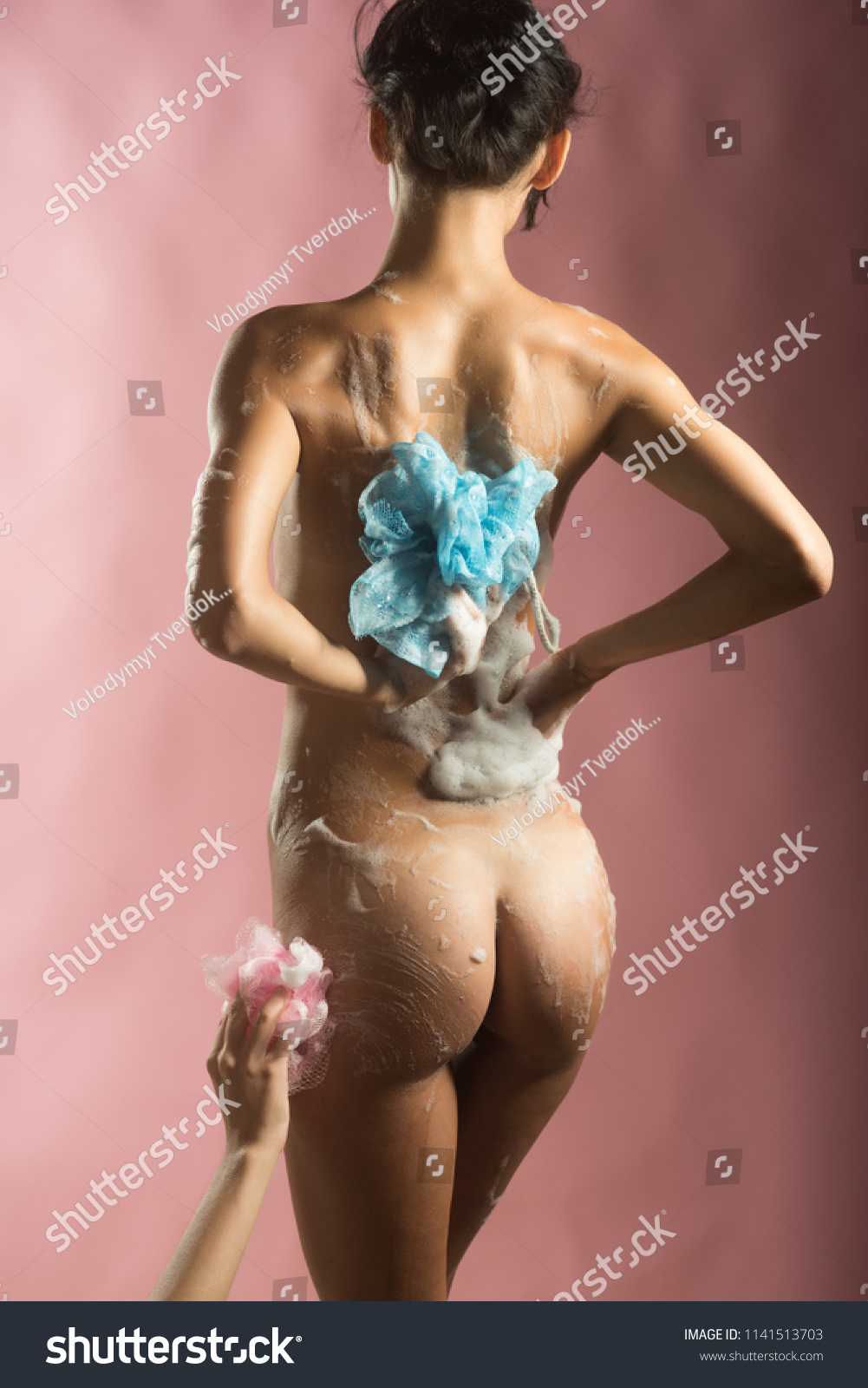 Man washing nude girl