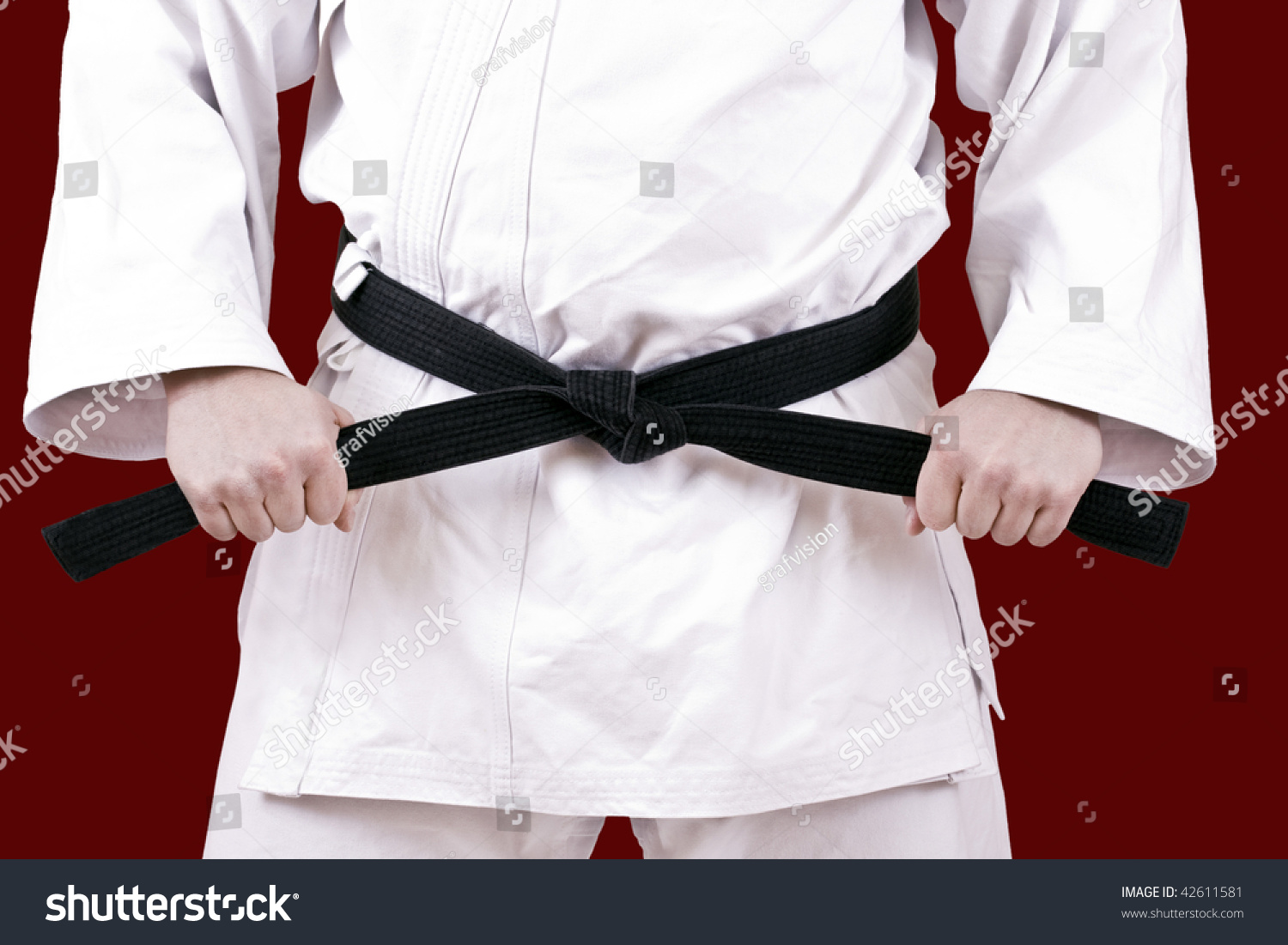 Martial Arts Athlete Tying The Knot To His Black Belt Stock Photo ...