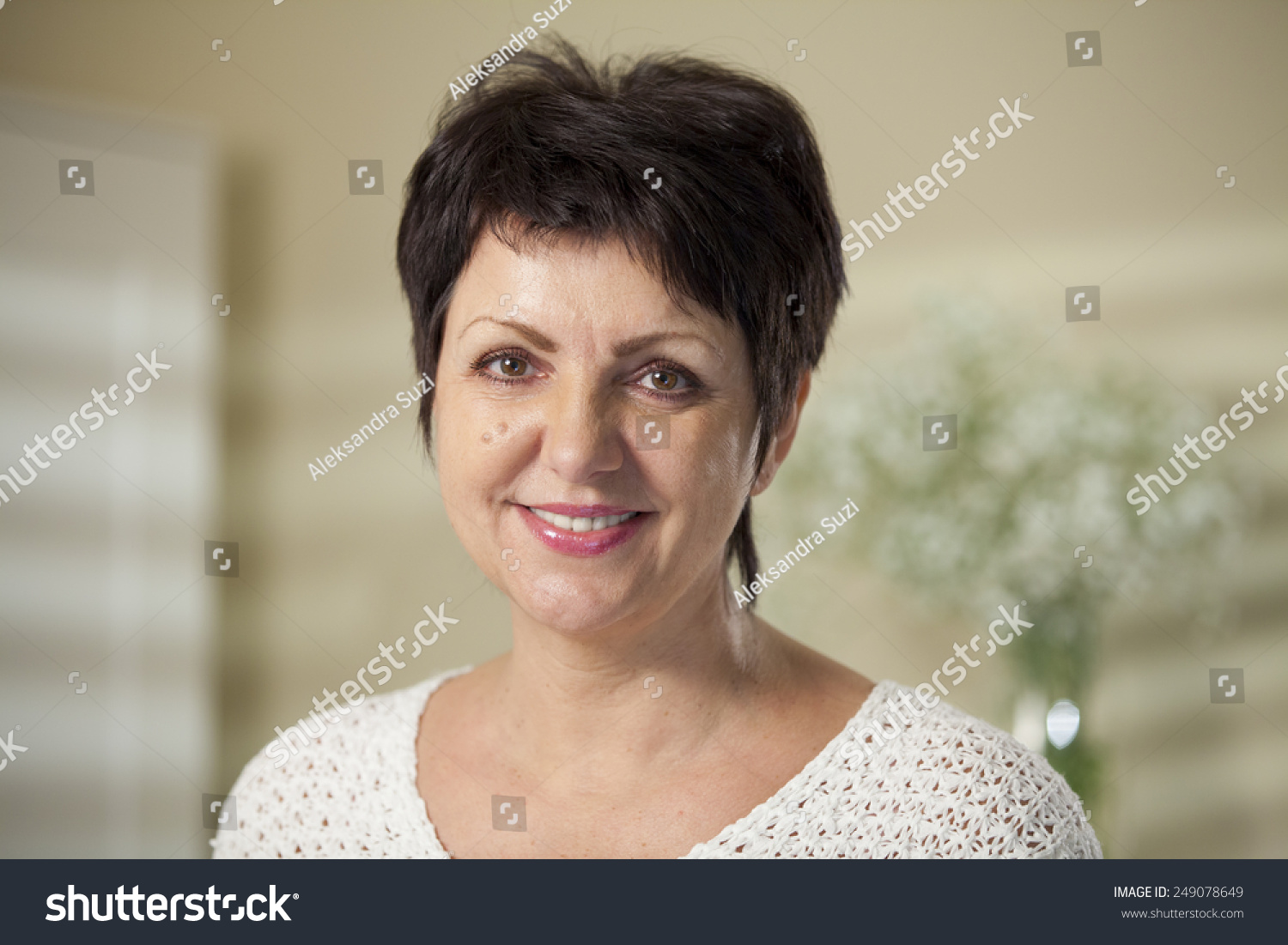 Mature Woman Smiling Stock Photo 249078649 : Shutterstock