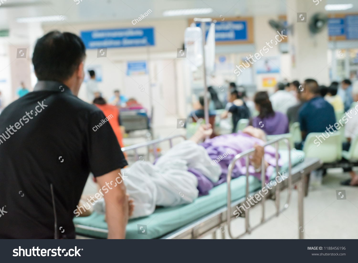 medical-workers-moving-patient-treatment-hospital-stock-photo