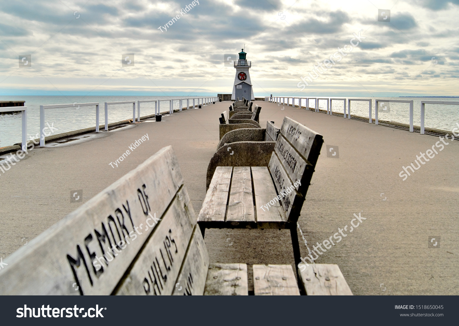 Memorial Benches Lighthouse On Pier Port Stock Photo Edit Now 1518650045