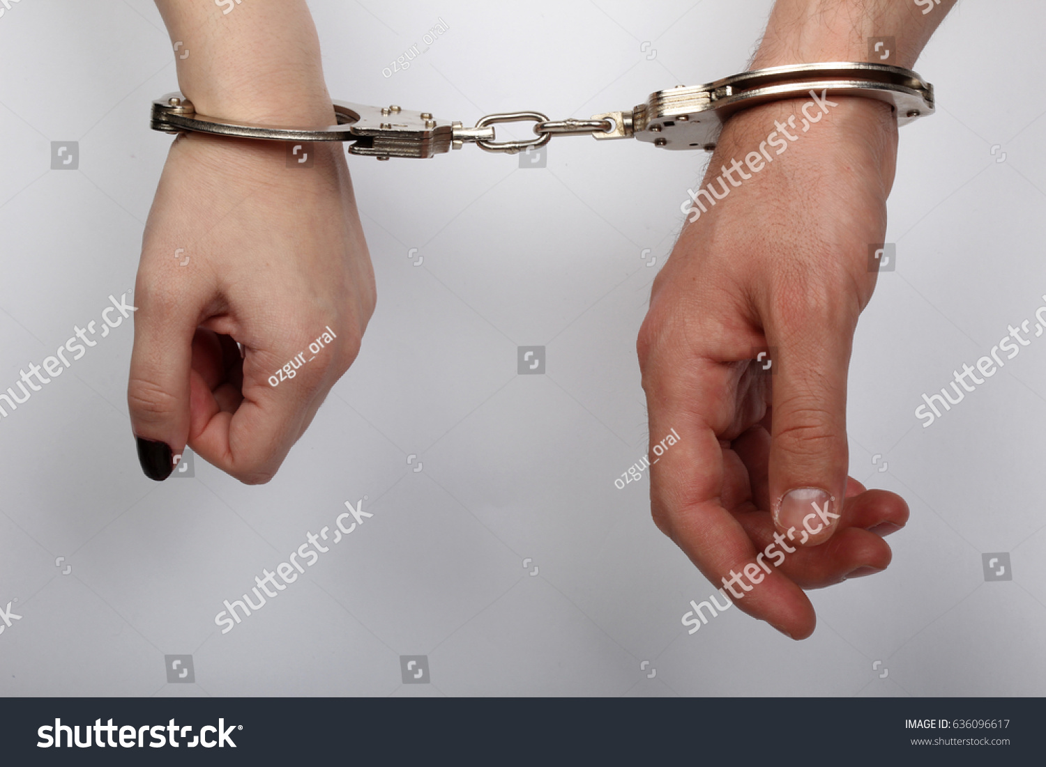 Men Women Cuffed Hands Together Stock Photo (Edit Now) 636096617