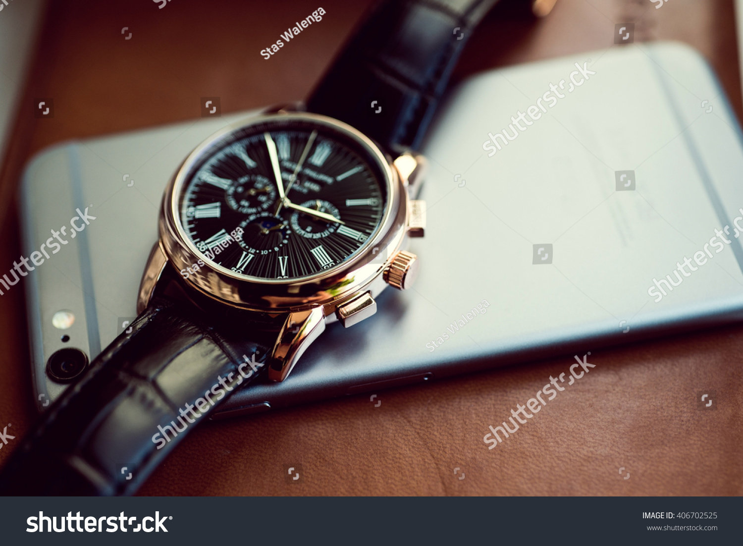 golden mobile watch