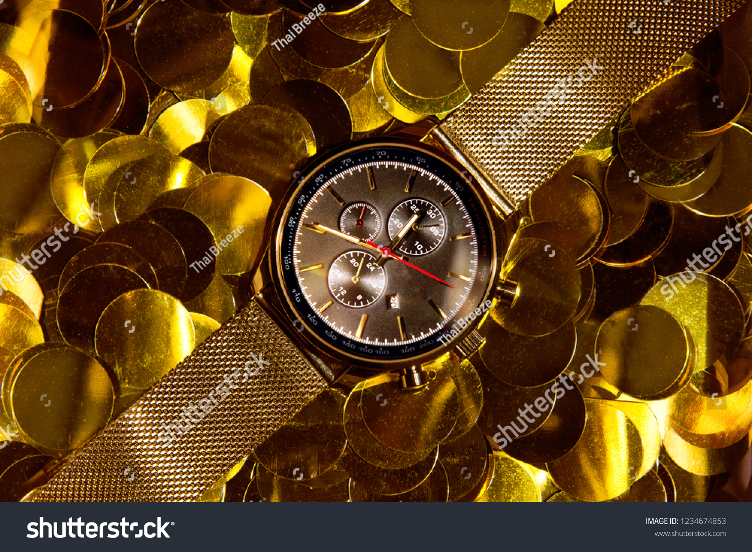 golden hand watch