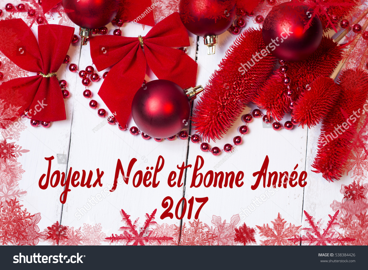 Merry Christmas And Happy New Year 2017 In French Card Surrounded By Red Christmas Decor Stock