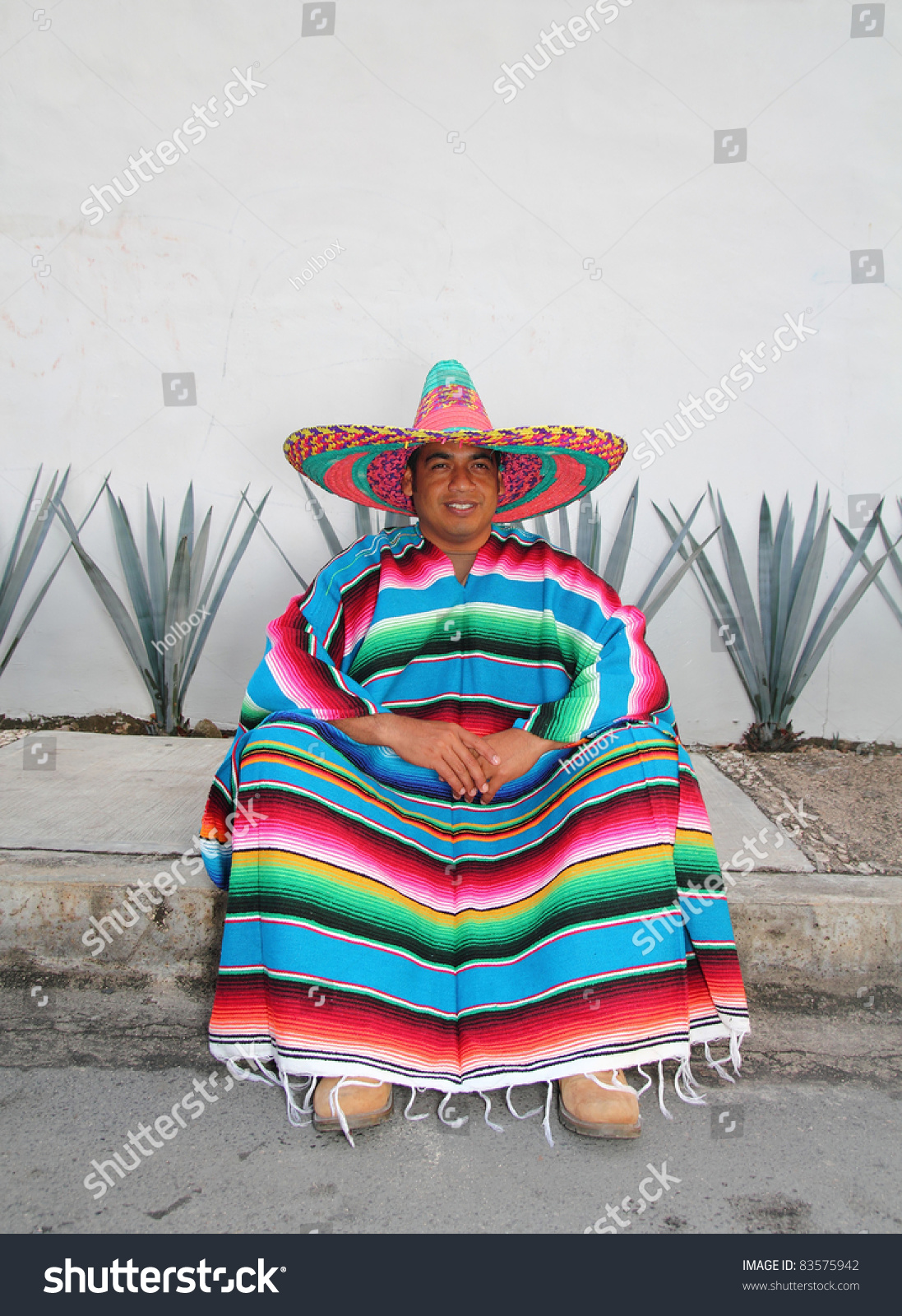 Mexican Sombrero Smiling Man Sitting With Poncho In Front Of Agave ...