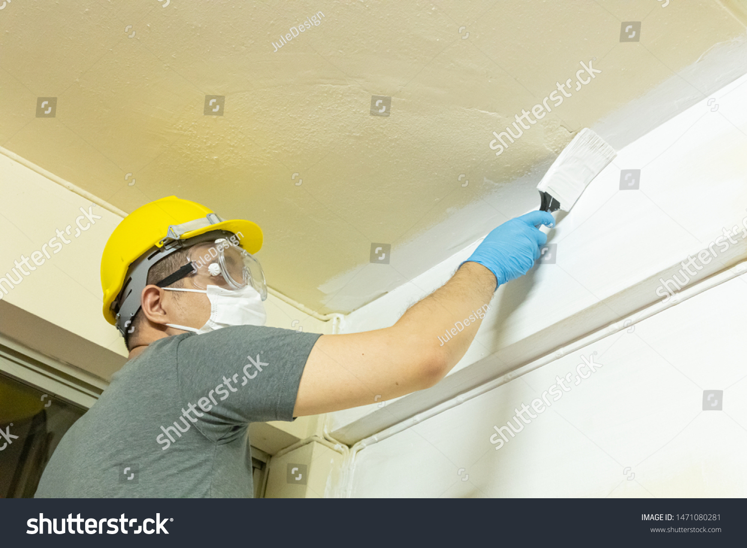 Middleage Asian Man Holding Paint Brush Stock Photo Edit Now