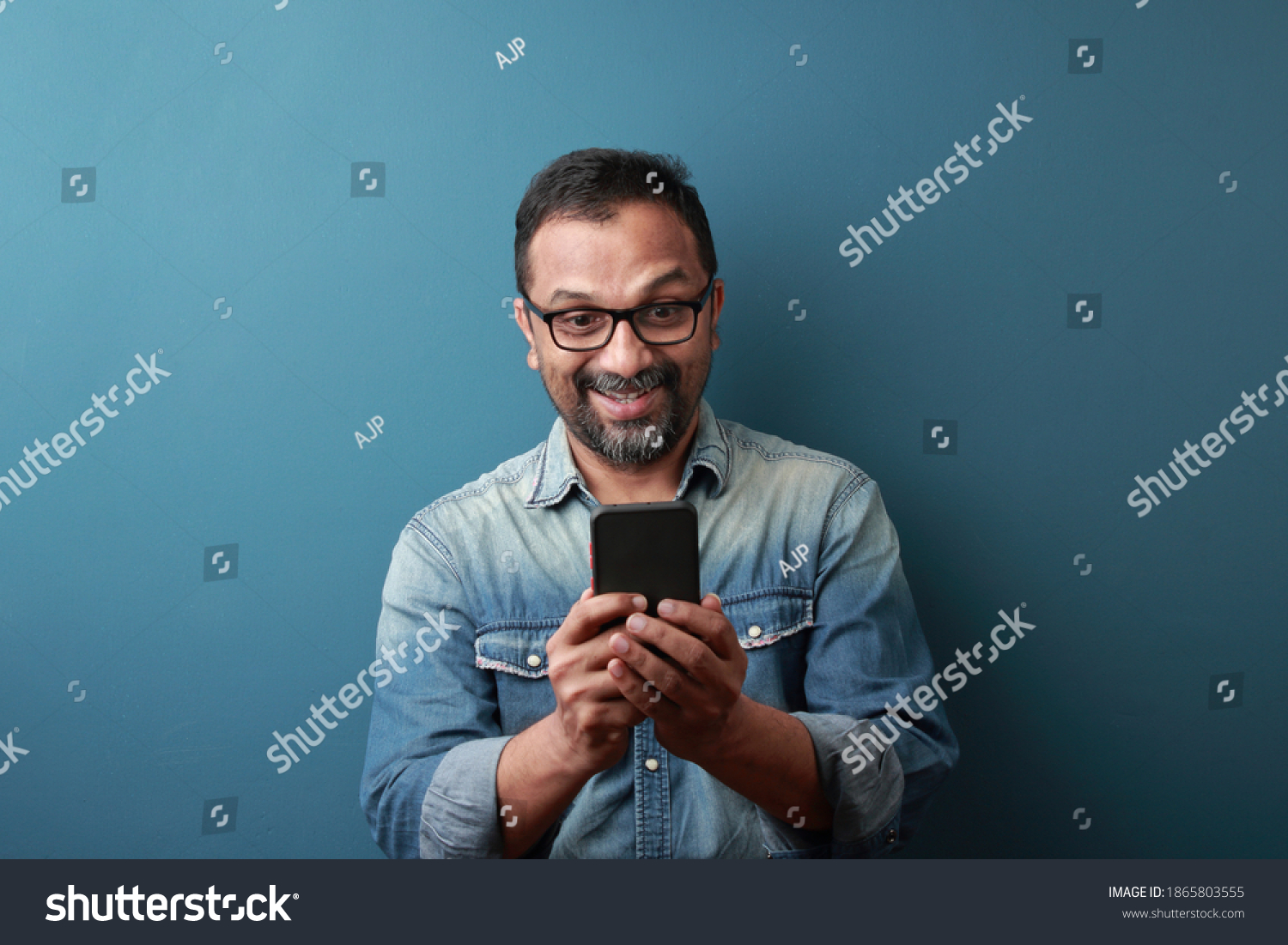 Middle Aged Man Indian Origin Looking Stock Photo (Edit Now) 1865803555