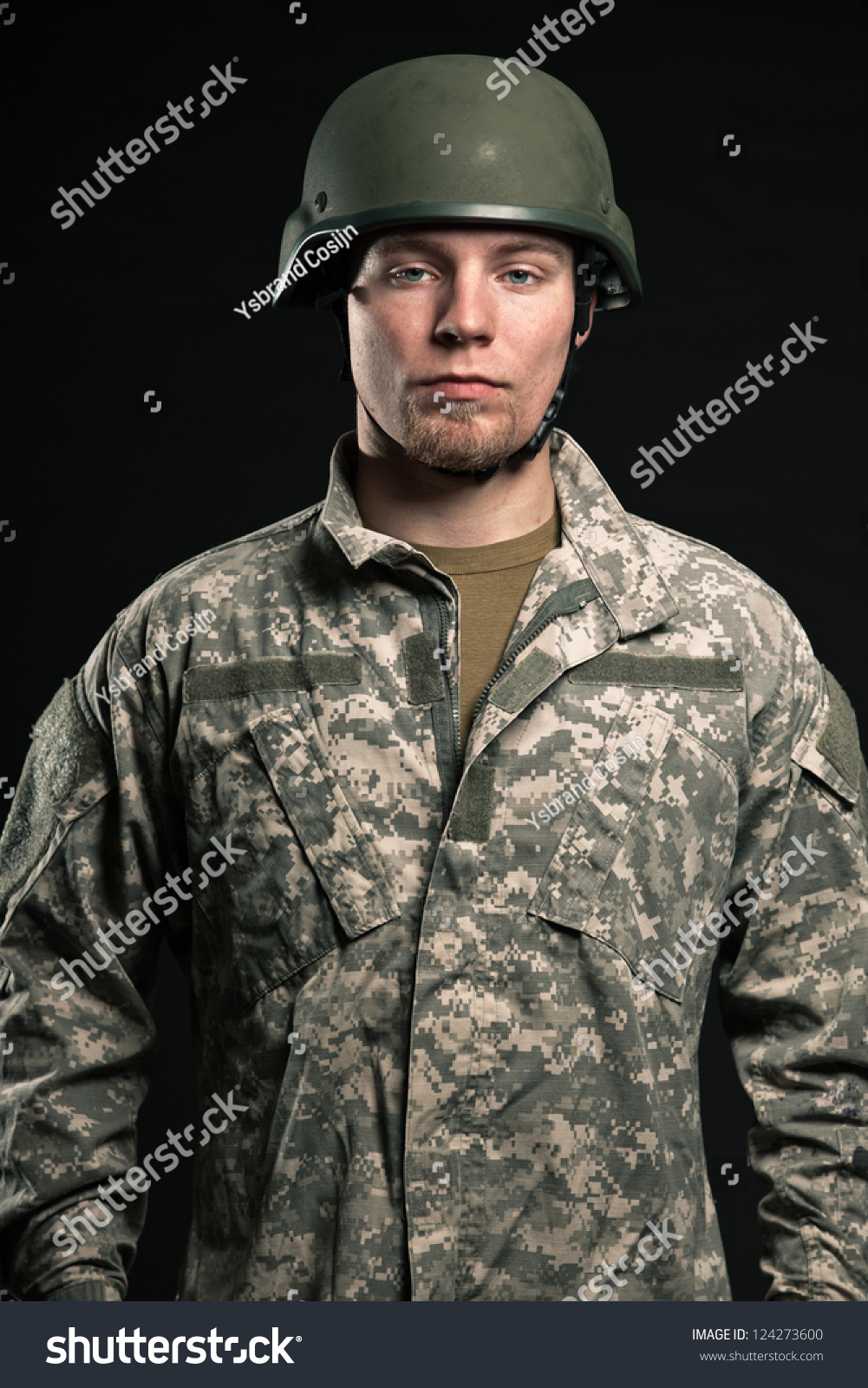 Military Young Man Wearing Helmet. Studio Portrait. Stock Photo ...