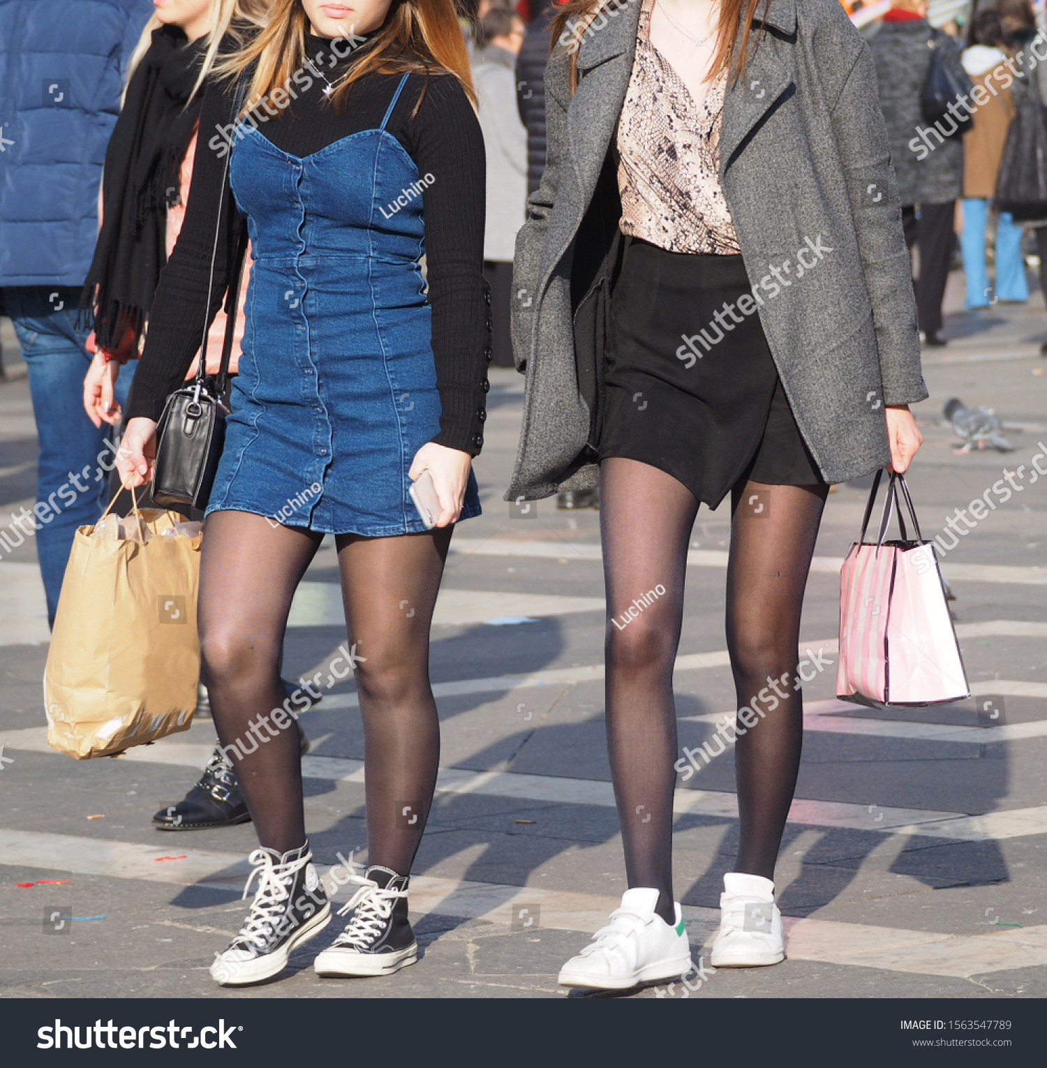 Women in mini skirts and pantyhose