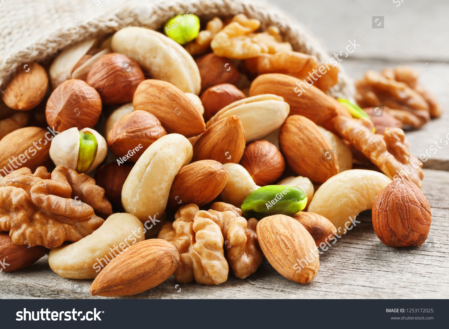 mix-different-nuts-wooden-cup-against-stock-photo-edit-now-1253172025