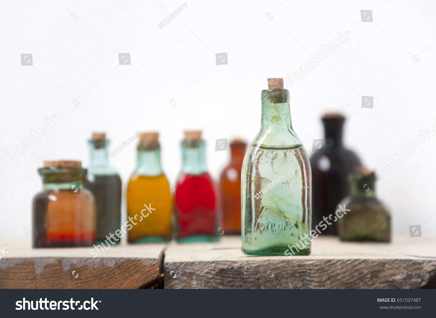 Download Mock Small Glass Antique Bottle Liquids Stock Photo Edit Now 651597487