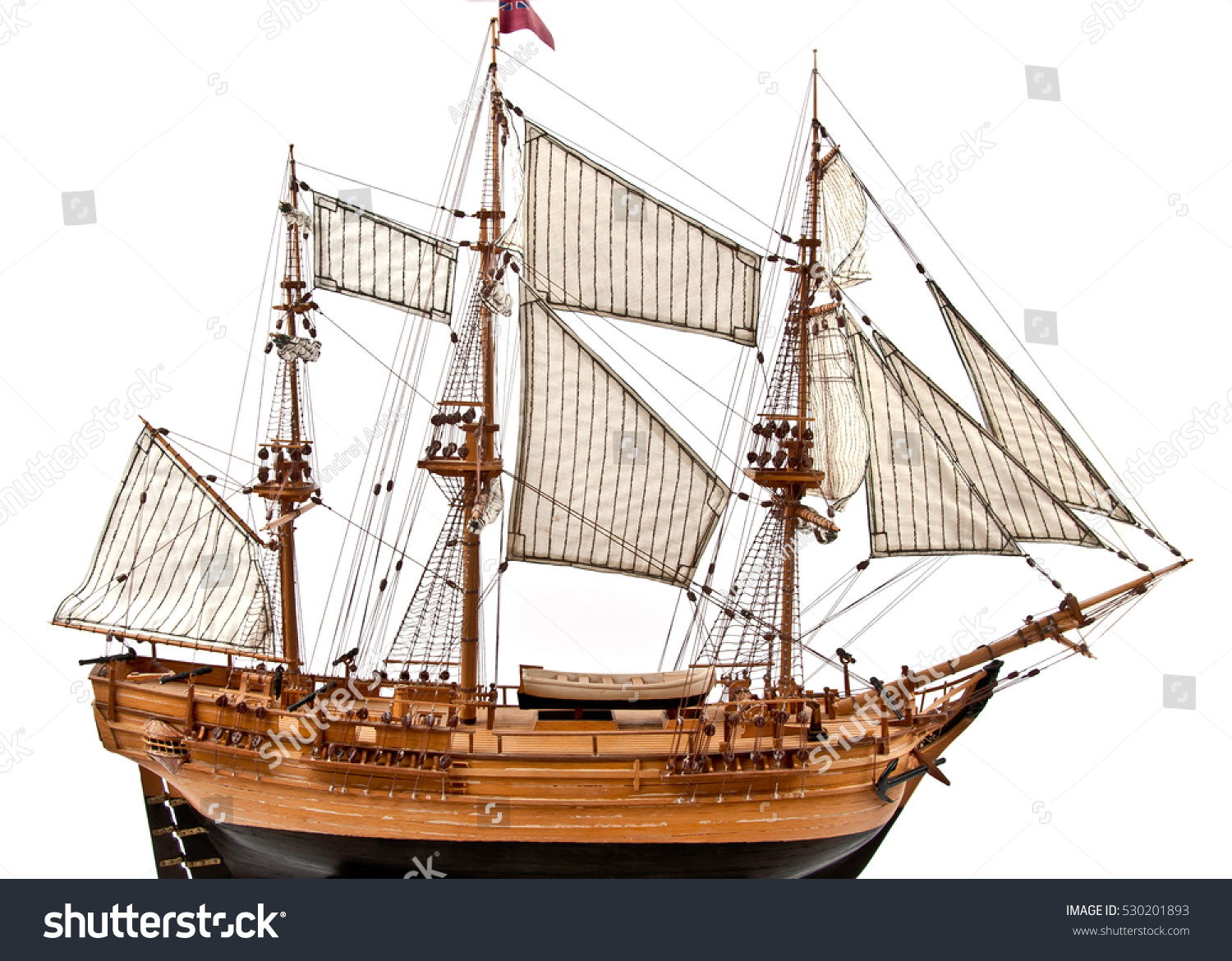 Il fascino dei velieri Stock-photo-model-of-wooden-sailing-ship-with-three-mast-isolated-on-white-530201893