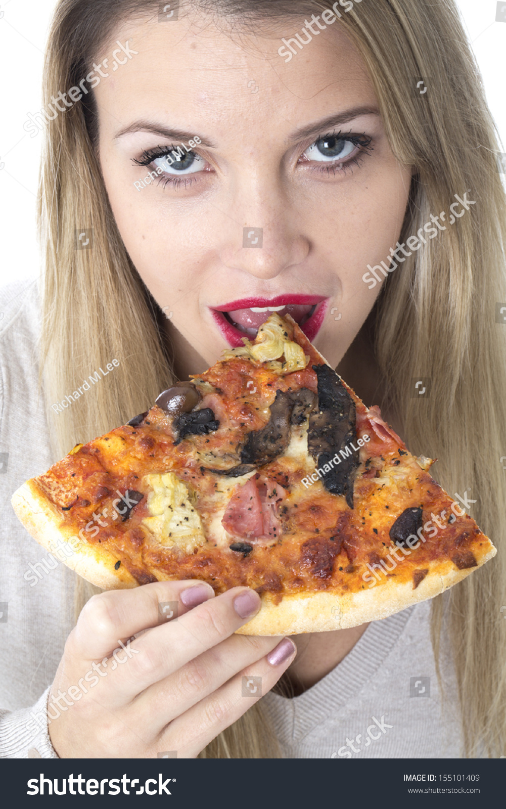 Model Released. Attractive Young Woman Eating Pizza Stock Photo ...