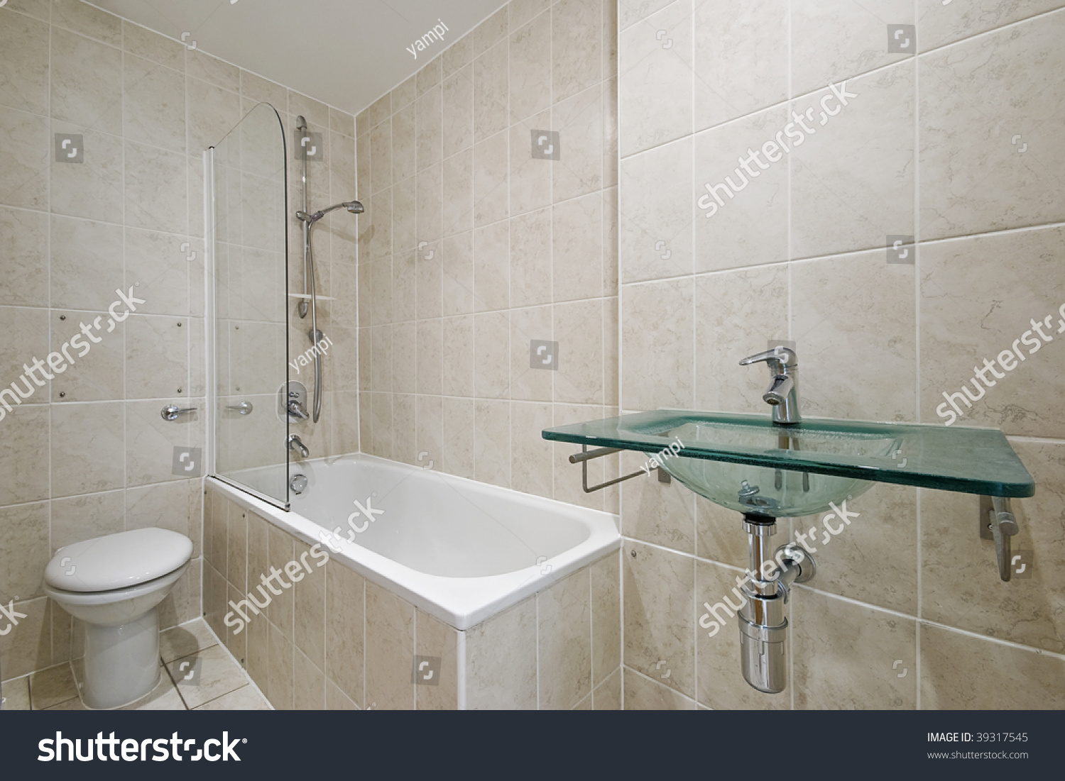 Modern Bathroom With Floor To Ceiling Ceramic Tiles Stock Photo ...