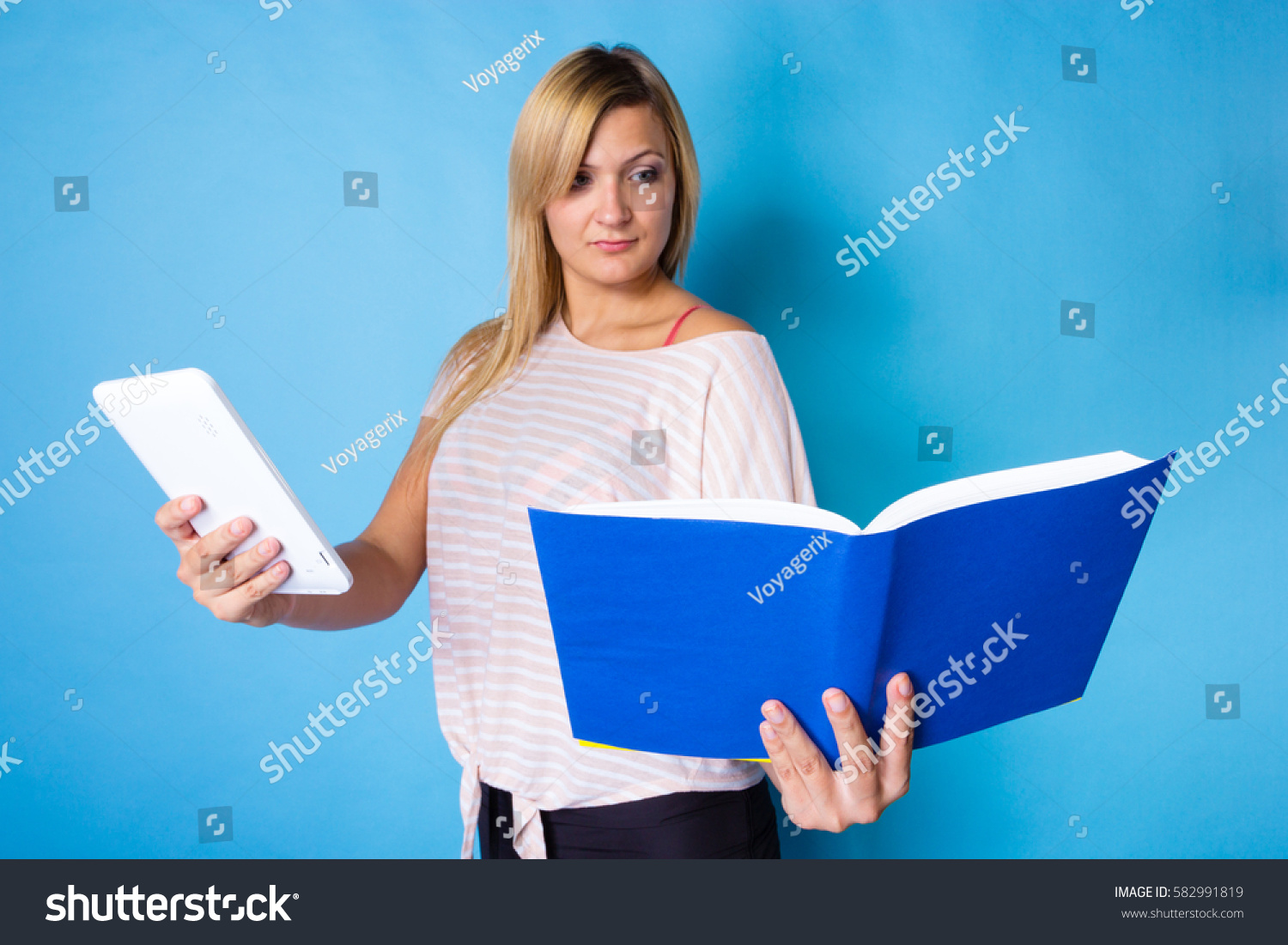 modern-education-devices-reading-books-learning-stock-photo-582991819