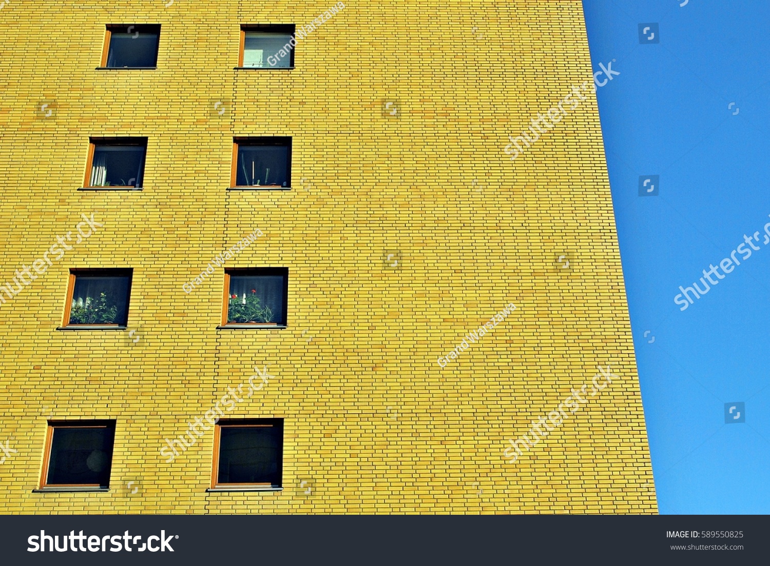 modern-luxury-apartment-building-stock-photo-589550825-shutterstock