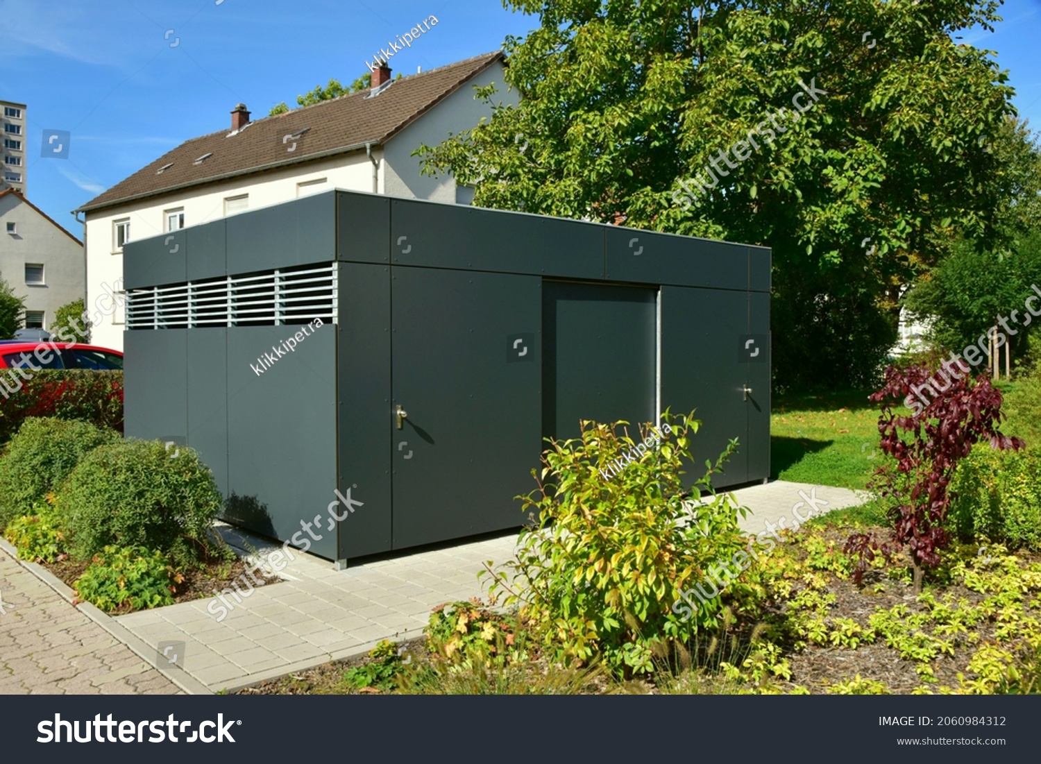 9 296 Steel Sheds Images Stock Photos Vectors Shutterstock   Stock Photo Modern Metal Tool Shed Bike Shed Or Garden Shed Or Garbage Collection System With In Front Of A 2060984312 