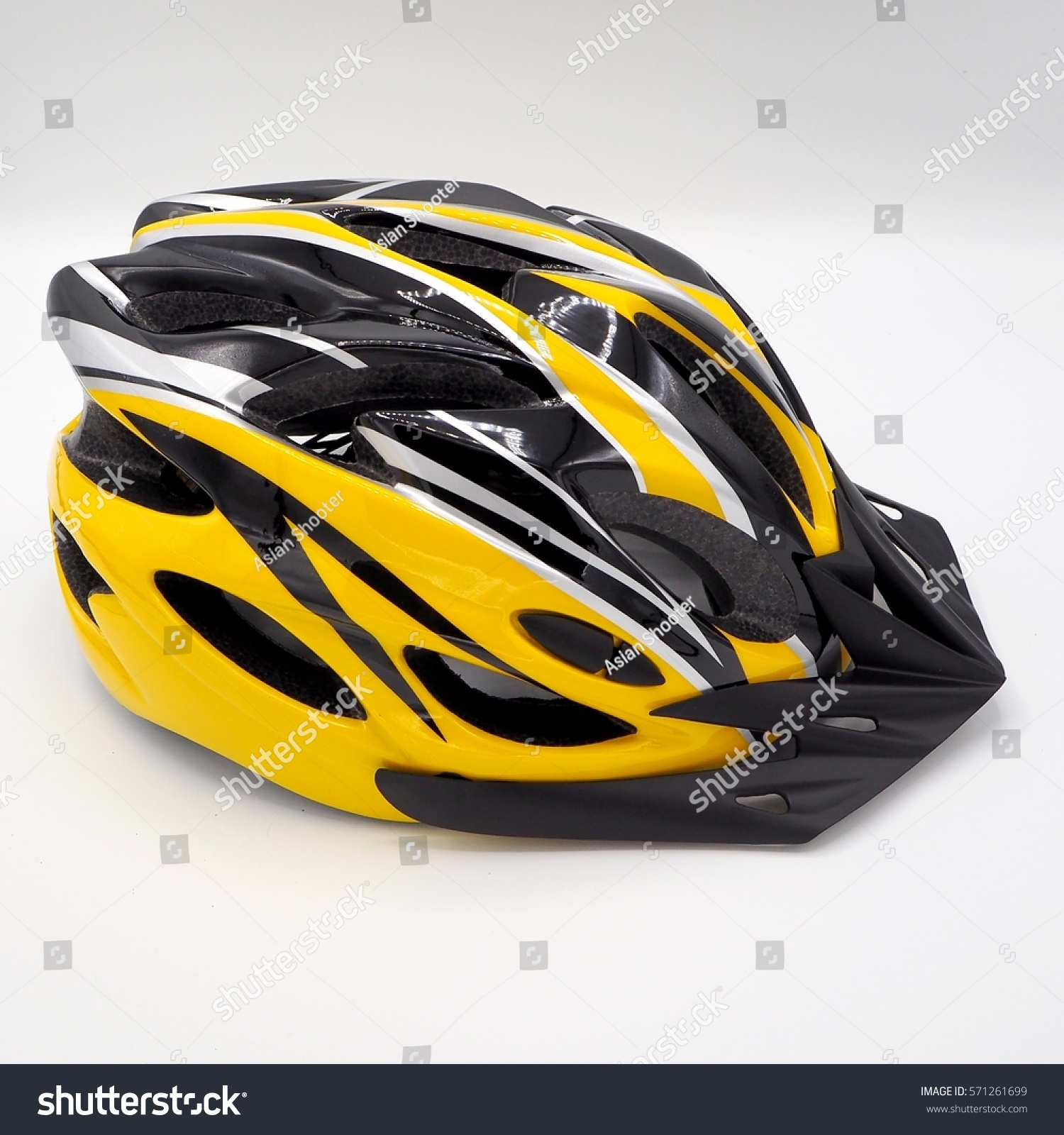 yellow and black bike helmet