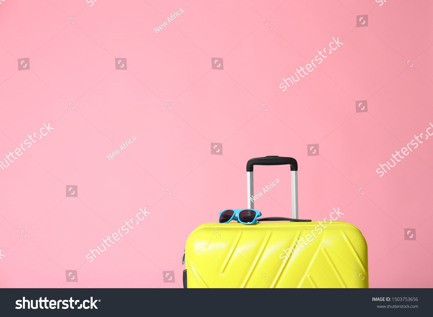 light yellow suitcase