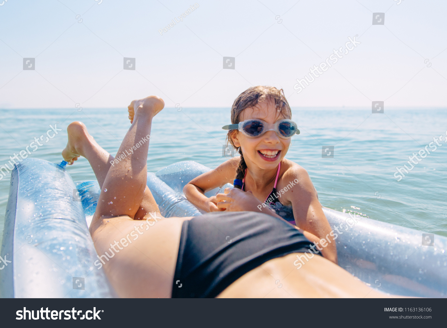 mom and daughter swim