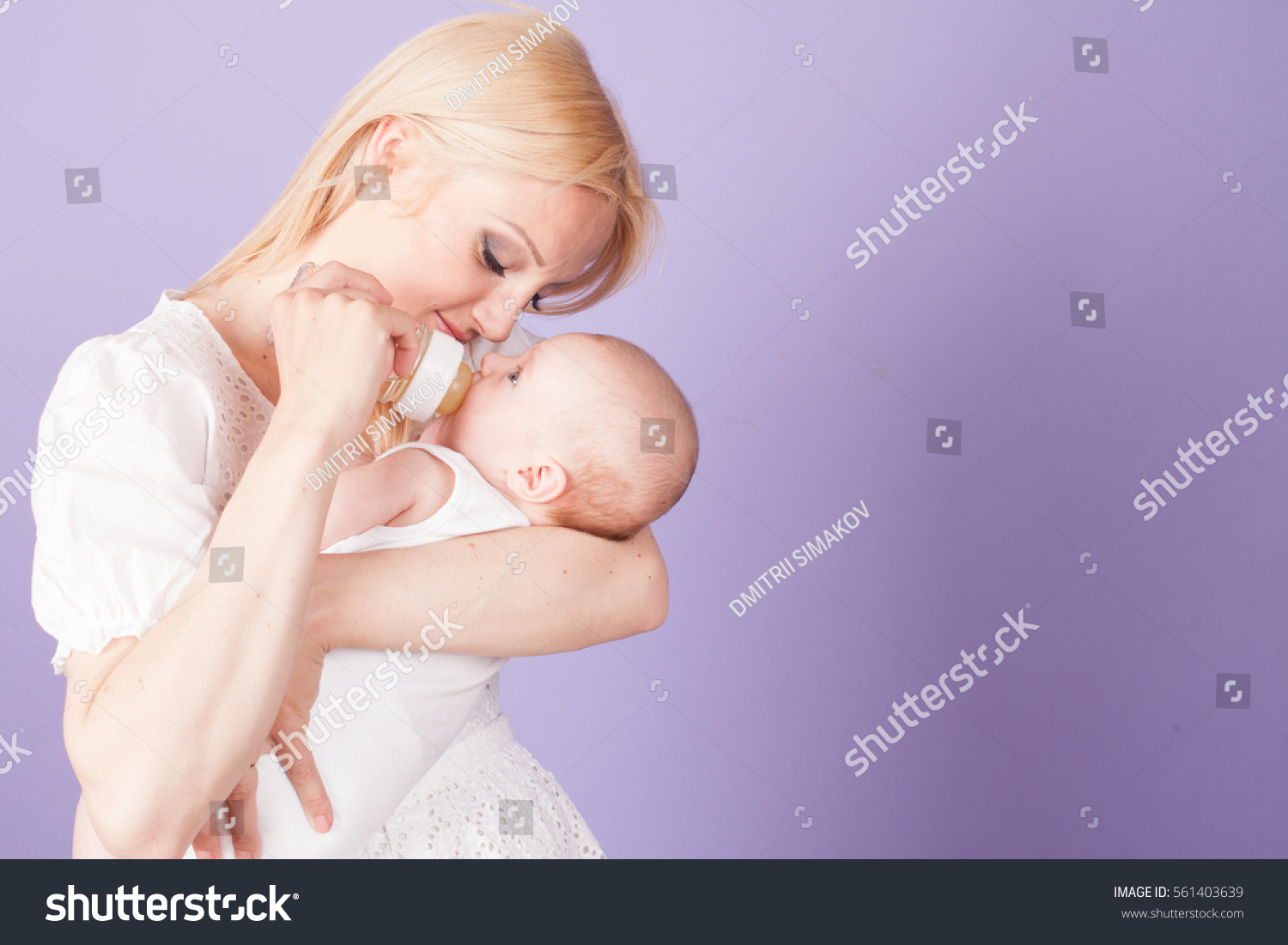 Mom Feeds Baby Bottle Teat Stock Photo Edit Now 561403639