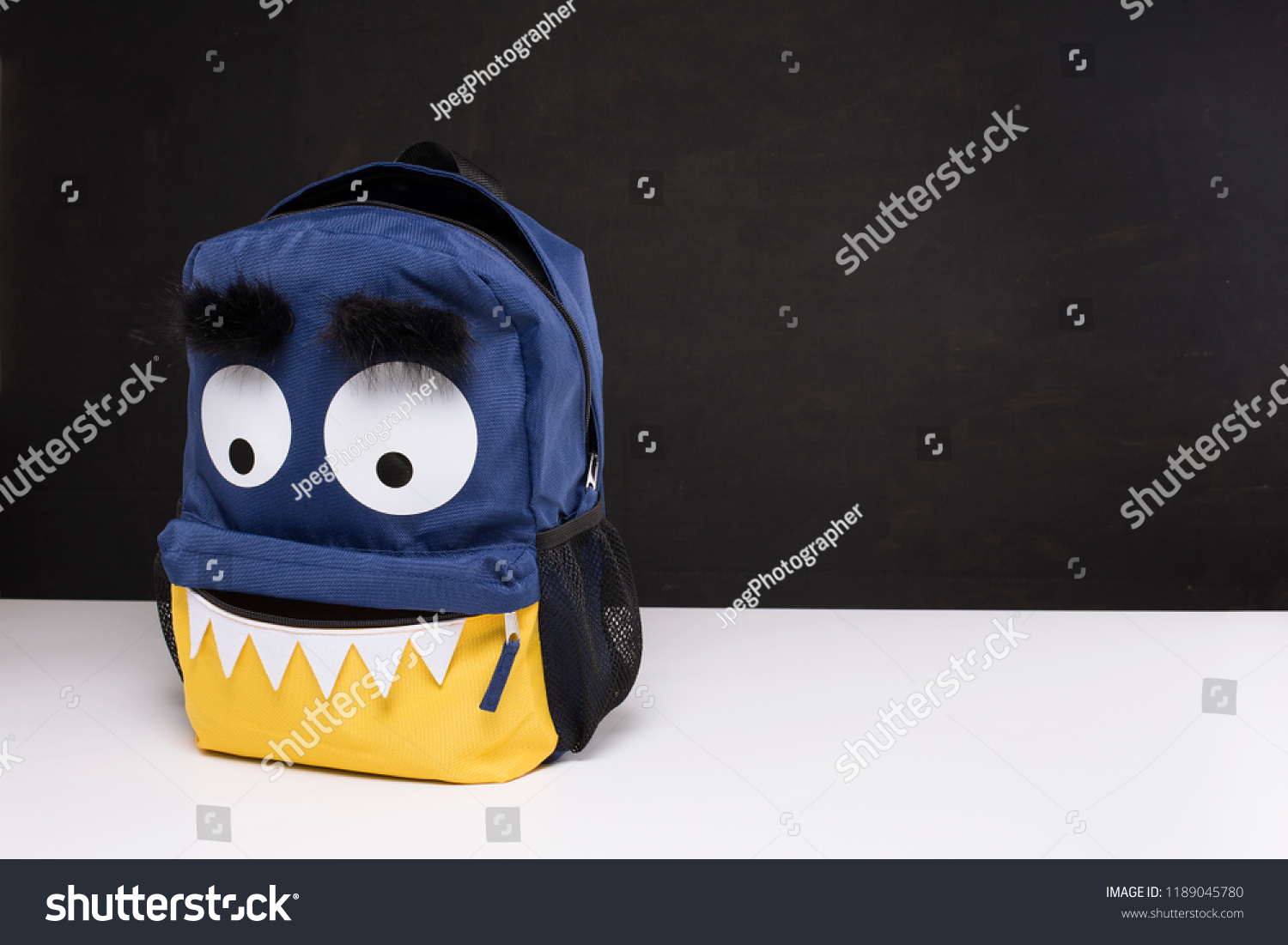 backpack with monster face