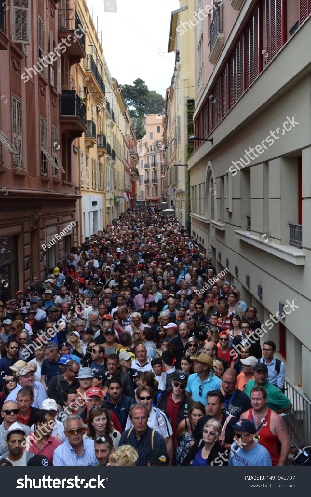 stock-photo-monte-carlo-monaco-may-a-huge-crowd-of-fans-and-spectators-leave-the-monaco-formula-1491942707.jpg
