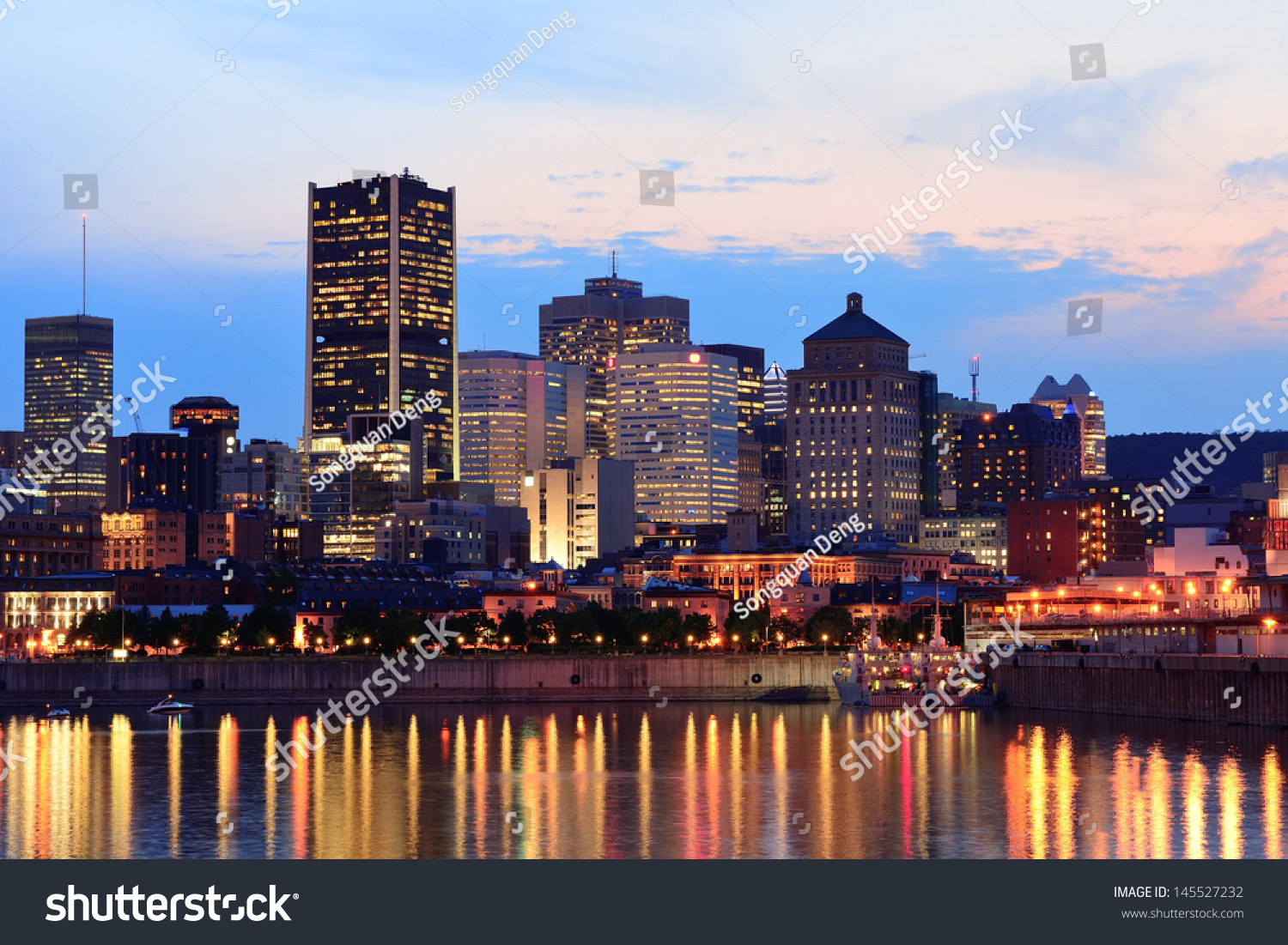 Montreal Over River At Sunset With City Lights And Urban Buildings ...