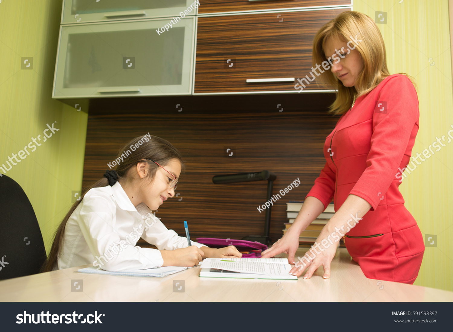 Mother Helping Her Daughter Stock Photo 591598397 