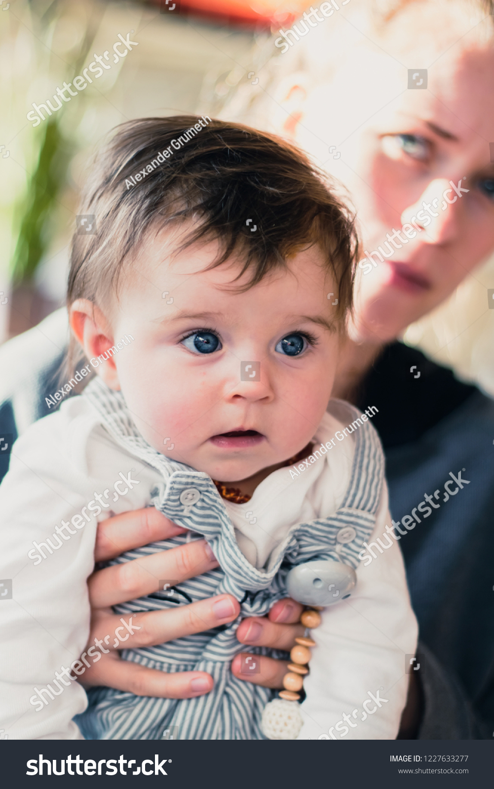 baby wearing dungarees