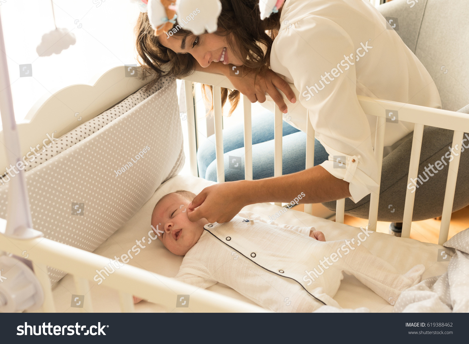 Mother Putting Baby Sleep Crib People Healthcare Medical Stock