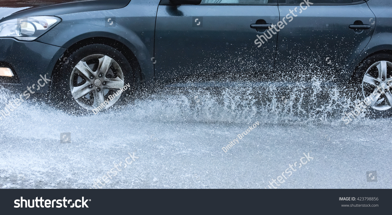 Motion Car Rain Big Puddle Of Water Spray From The Wheels Stock Photo ...