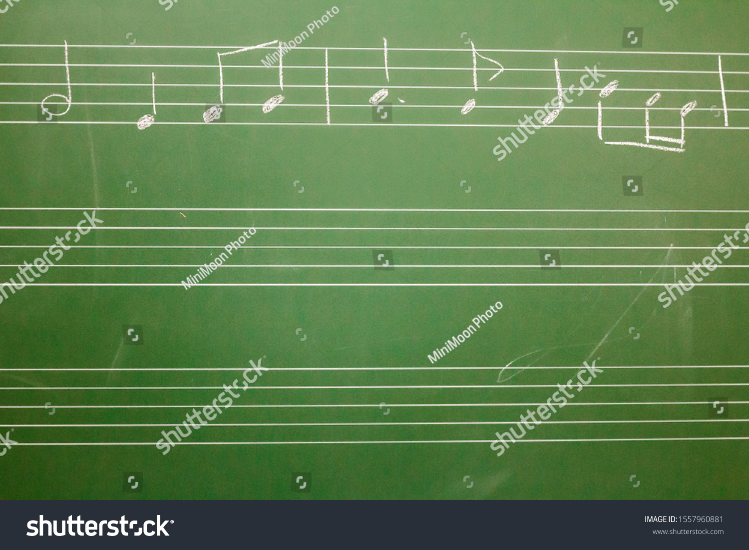 musical-notes-on-blackboard-stock-photo-1557960881-shutterstock