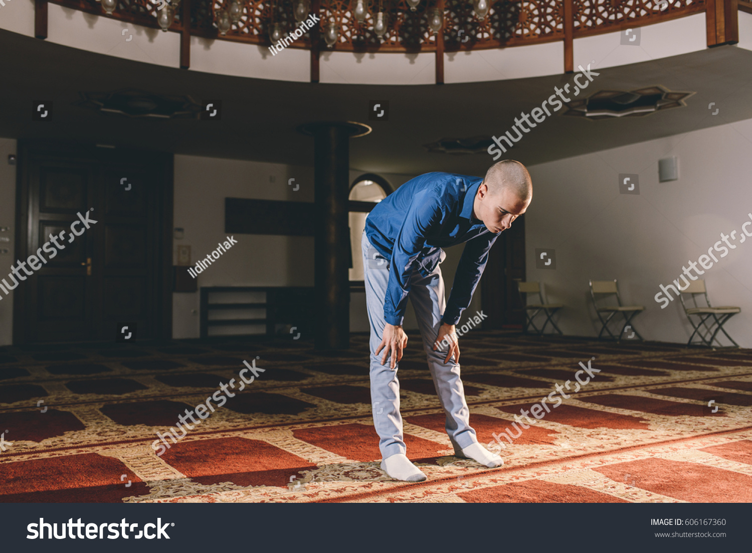 Muslim Teenager Bowing Prayer Camera Facing Stock Photo 606167360 