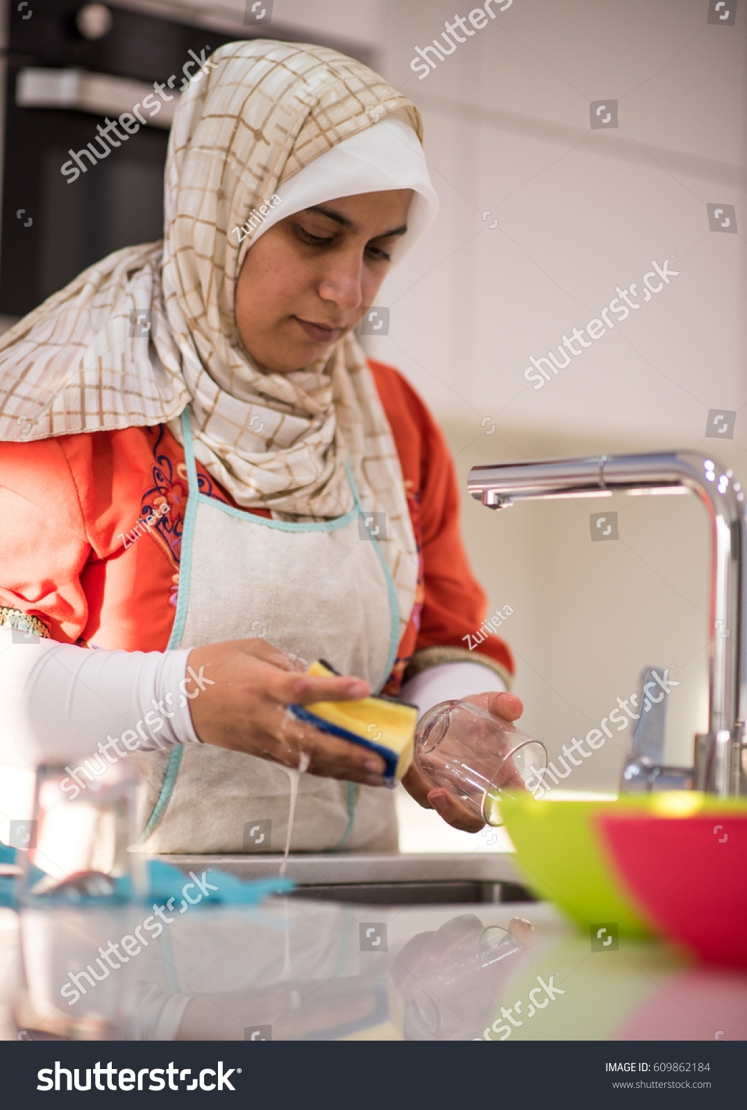 Muslim Traditional Woman Cleaning Kitchen Stock Photo 