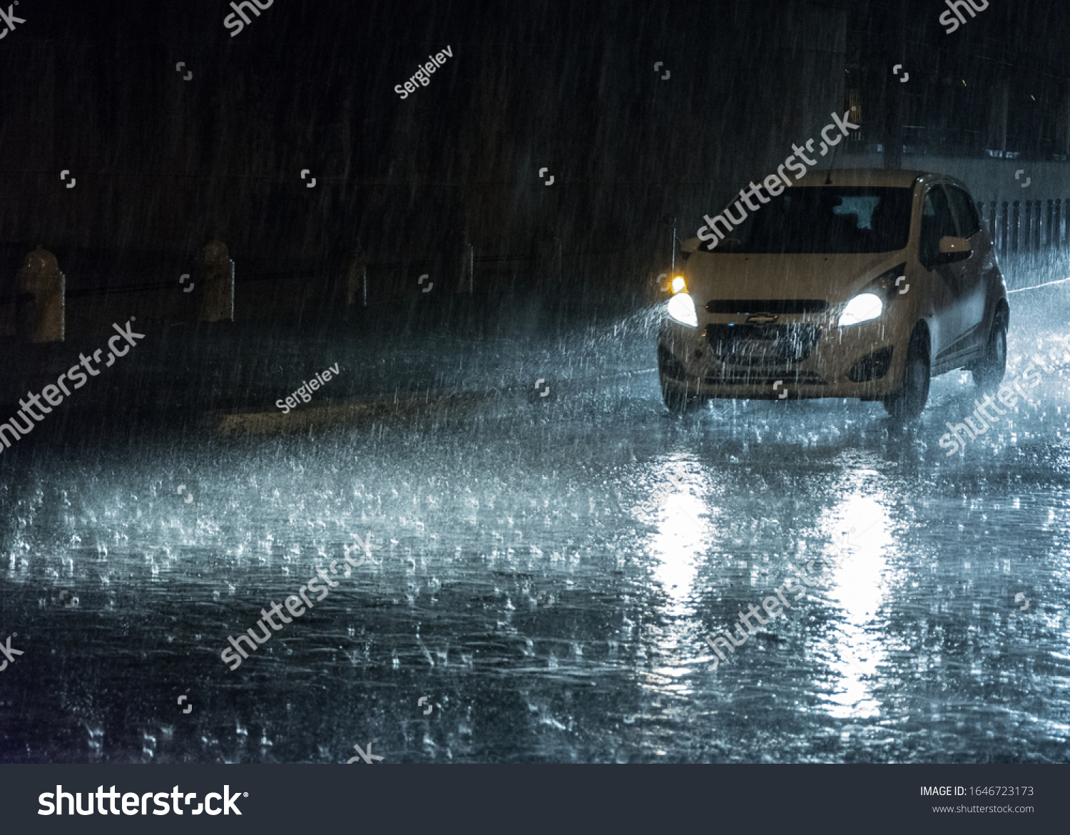 car driving night rain