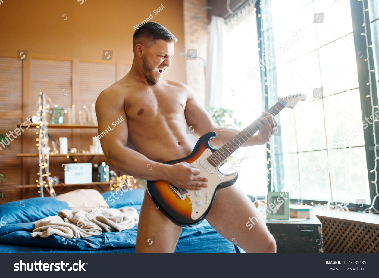 Nude Guys Playing Guitar