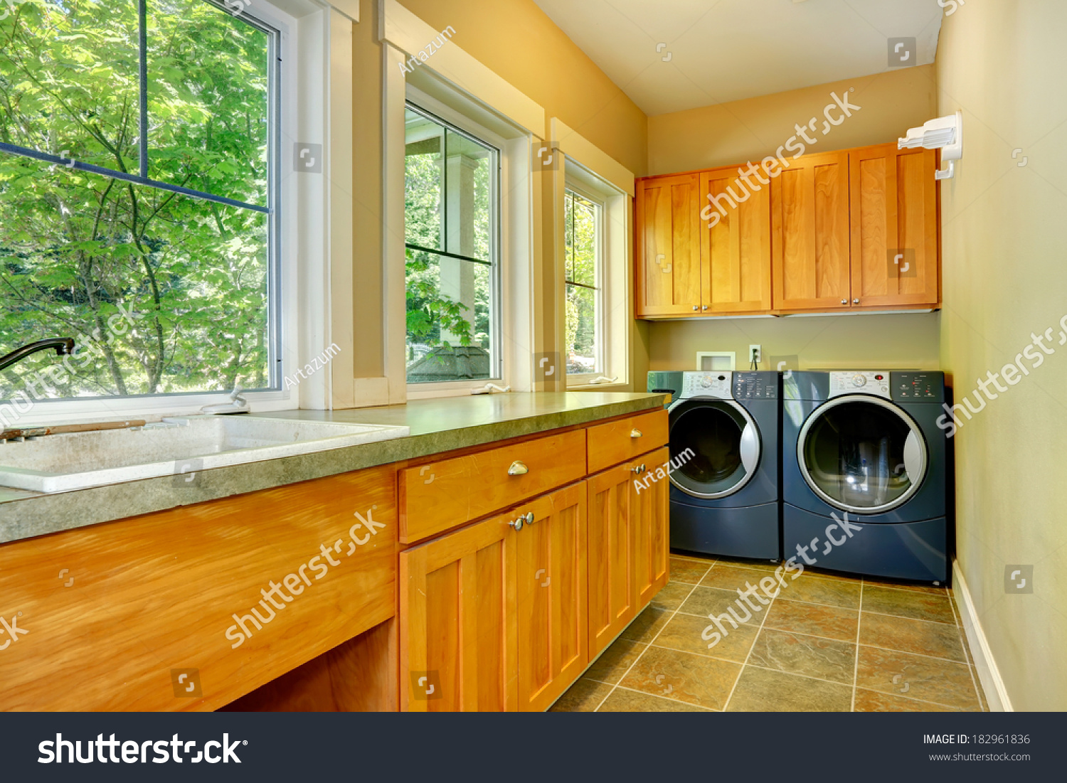 Narrow Laundry Room Wooden Cabinets Washer Stock Photo 182961836   Stock Photo Narrow Laundry Room With Wooden Cabinets Washer And Dryer 182961836 