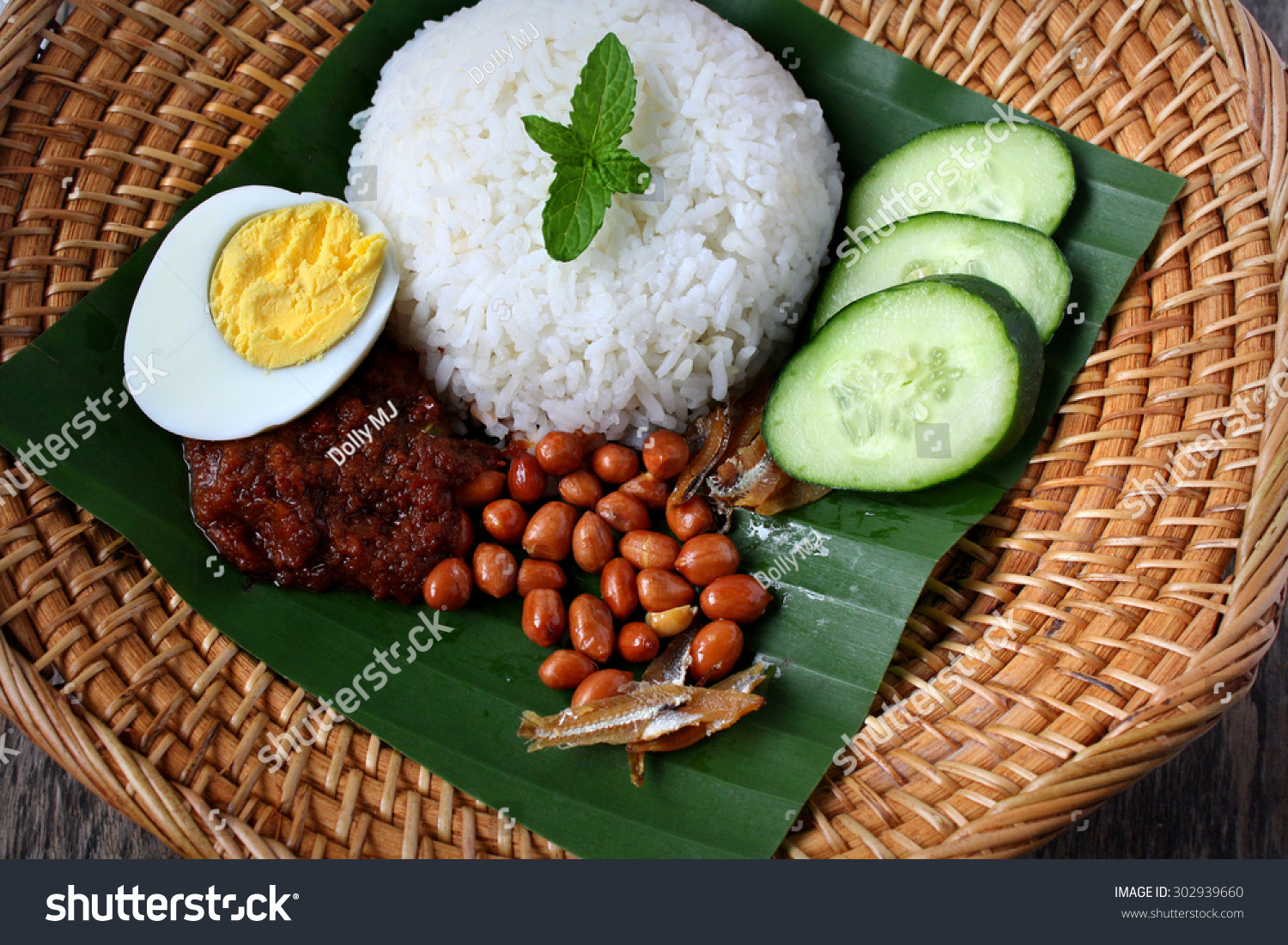 Nasi Lemak-Malaysian Cuisine. A Fragrant Rice Dish Cooked In Coconut ...