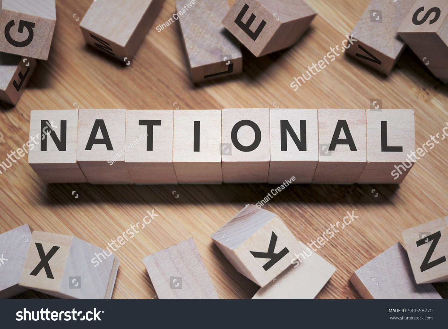 national-word-written-in-wooden-cube-stock-photo-544558270-shutterstock