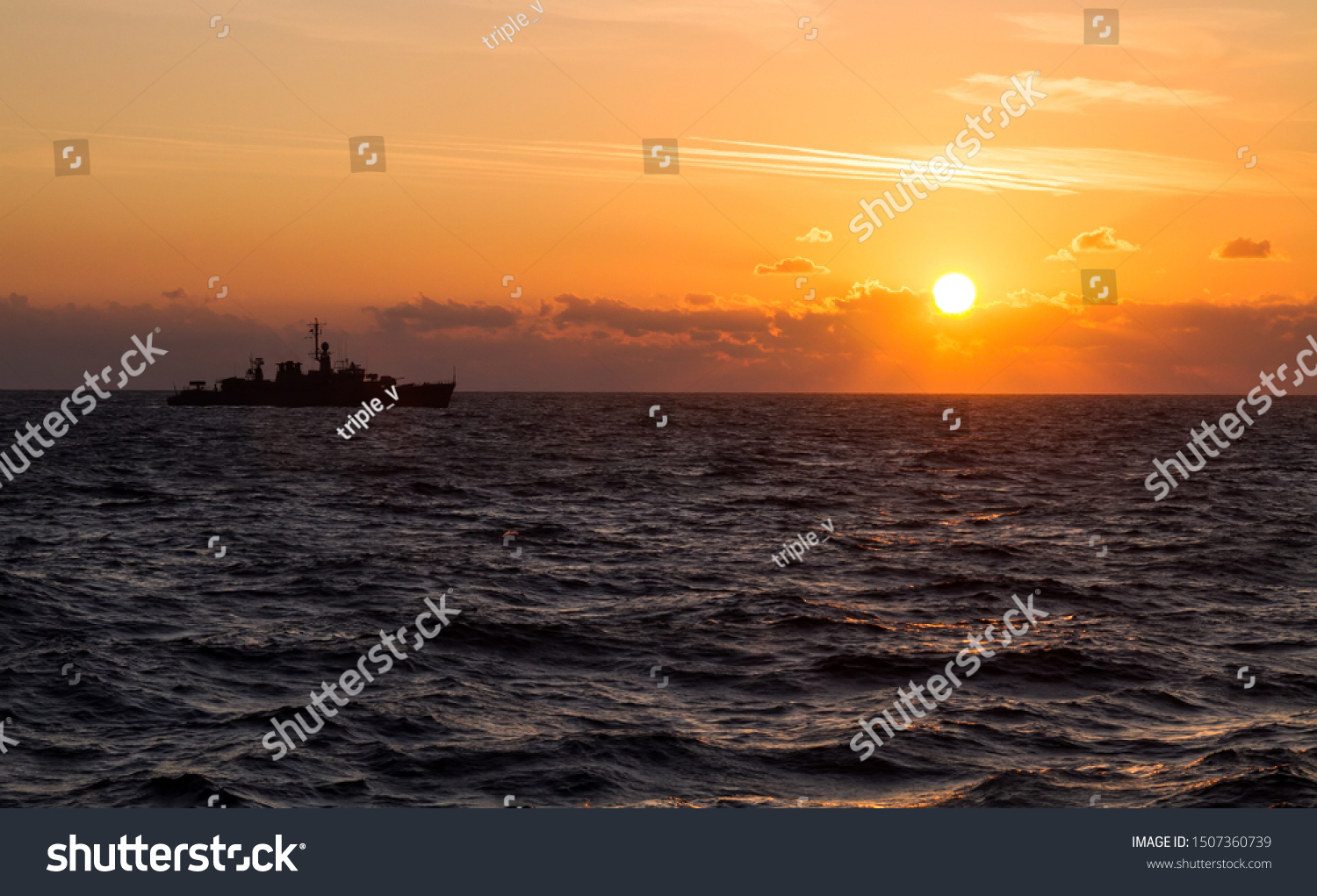 navy-military-ship-sailing-during-sunrise-stock-photo-edit-now-1507360739