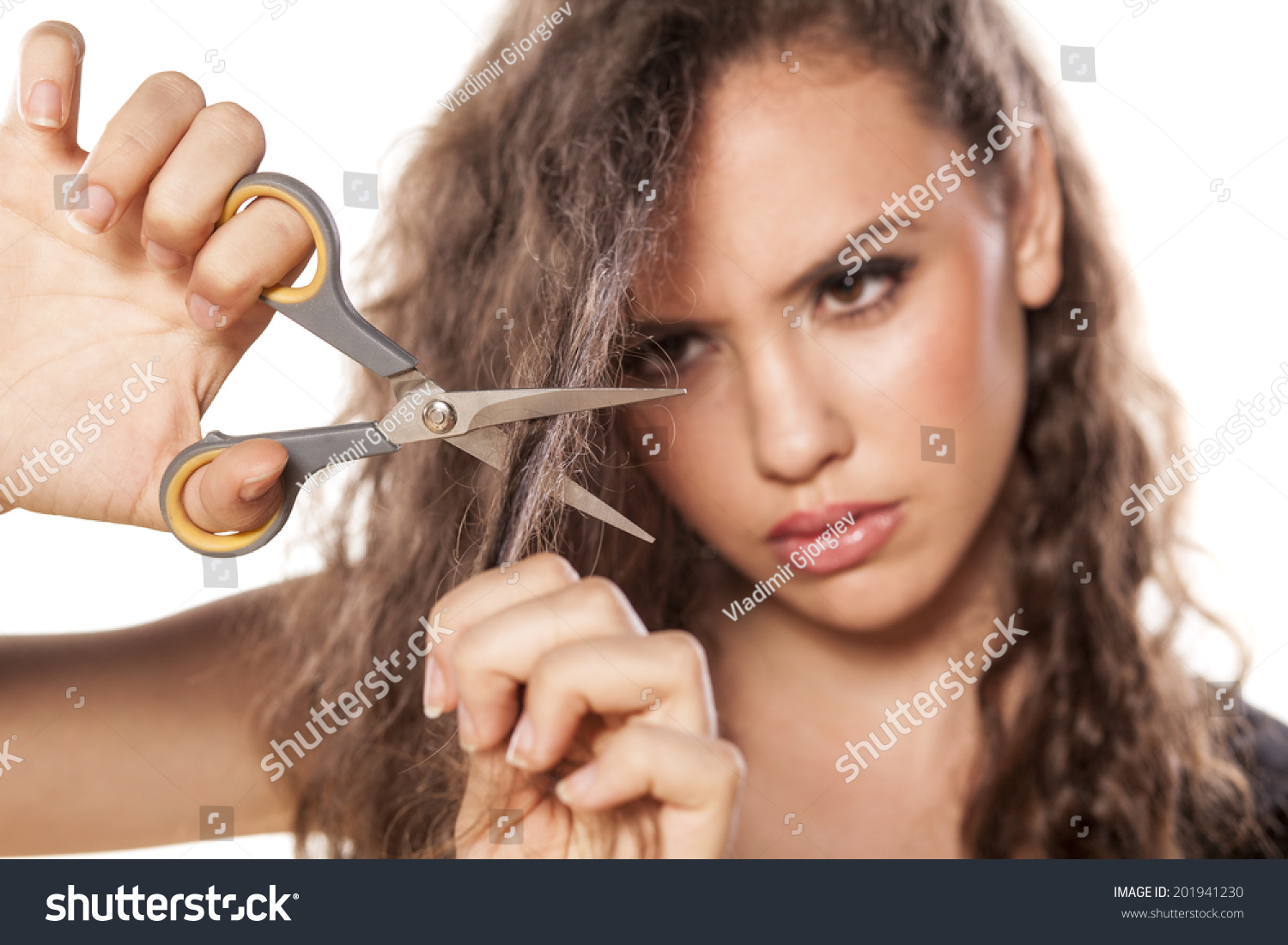 Nervous Girl Cuts Her Hair Scissors Stock Photo 201941230